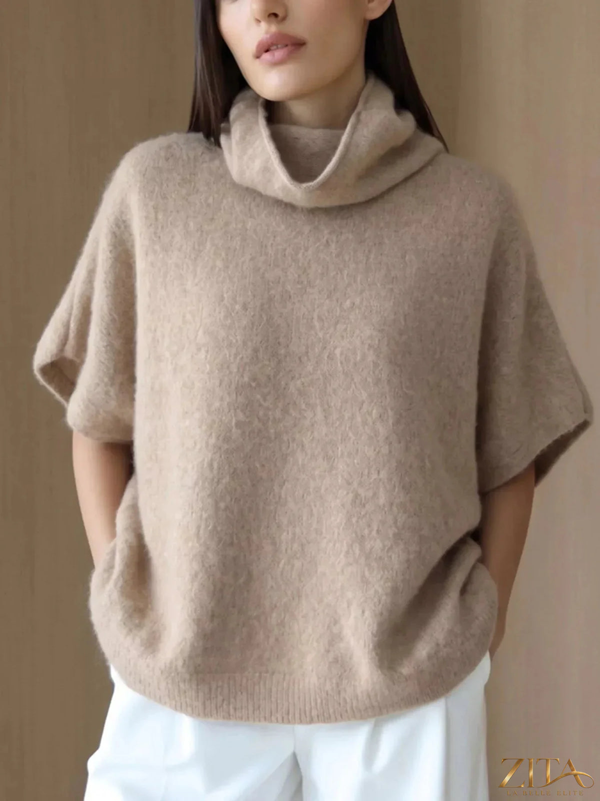 Zita La Belle Elite fuzzy turtleneck short sleeve sweater in soft, cozy fabric, shown in a stylish close-up shot.