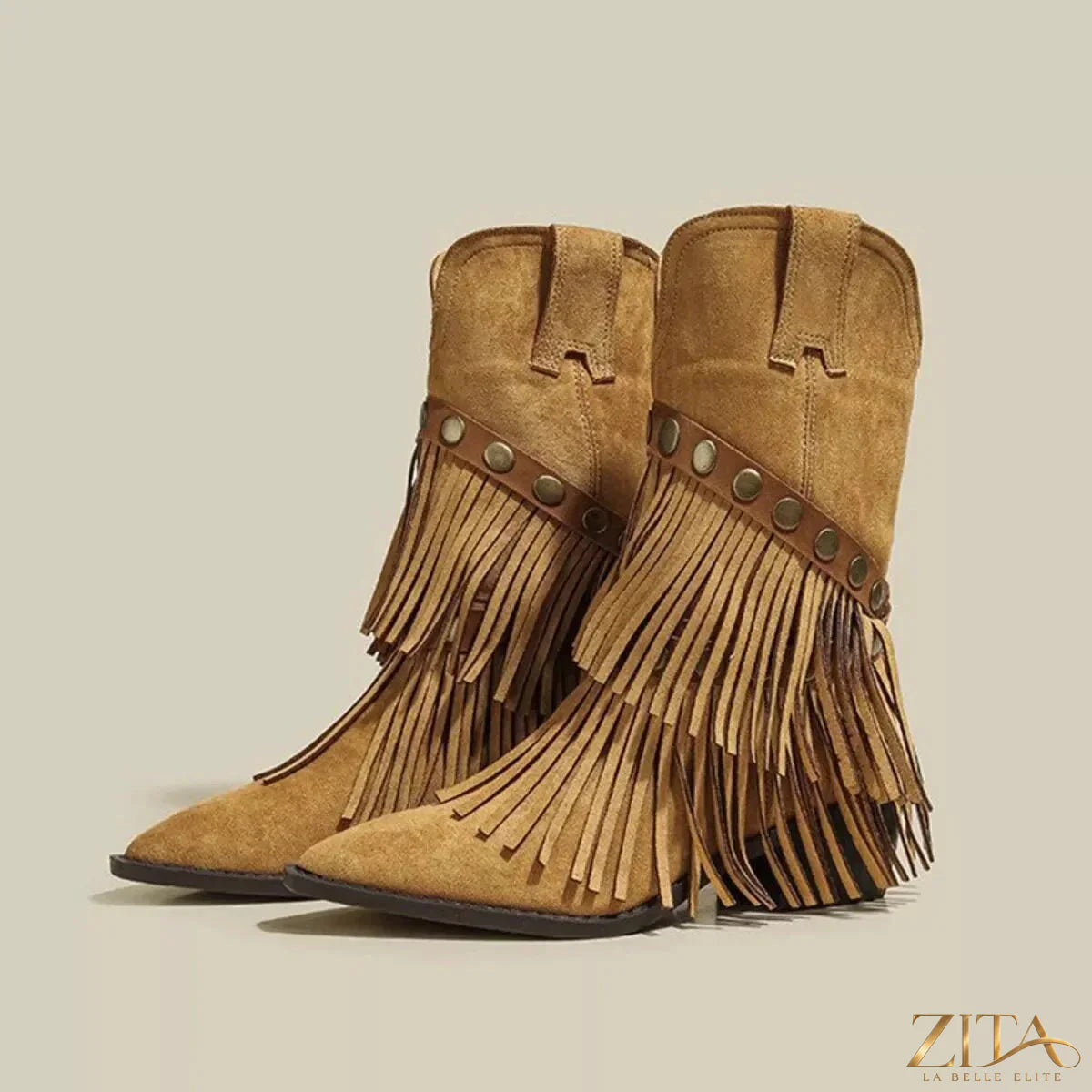 Vintage Zita La Belle Elite suede Western fringe boots with studded straps and intricate detailing.