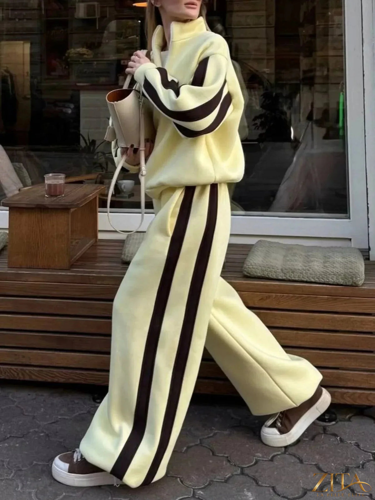Zita La Belle Elite contrast striped zip-up top and matching pants set, casual loungewear with bold black and white stripes.