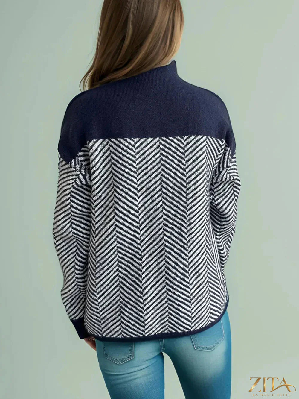 Contrast turtleneck long sleeve sweater from Trendsi, featuring a stylish design and cozy knit fabric, shown on a model.