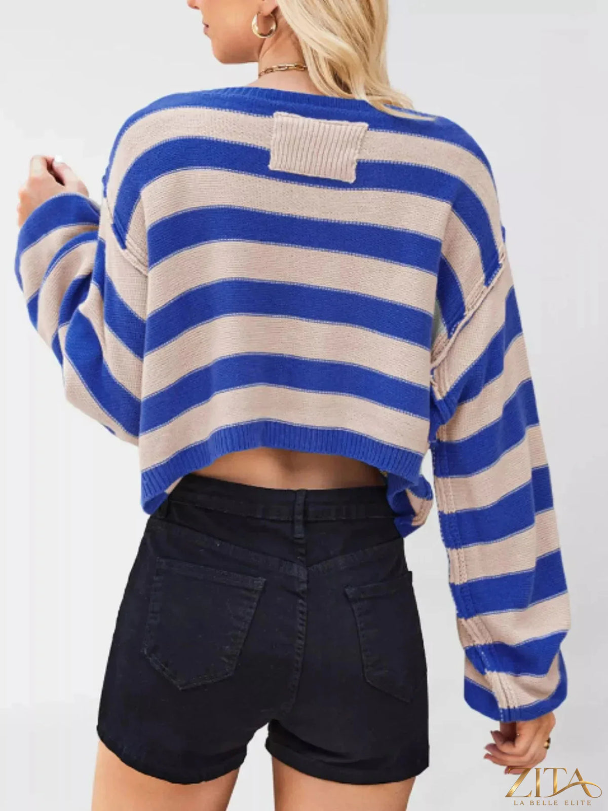 Striped boat neck sweater by Trendsi featuring a classic design with horizontal stripes and a comfortable fit.