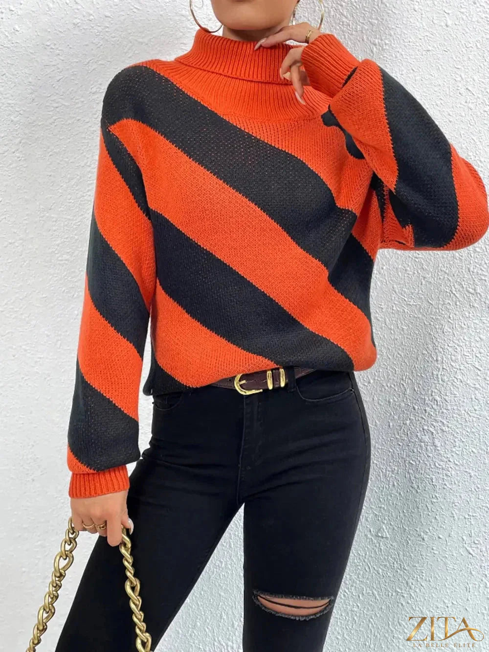 Striped turtleneck sweater with dropped shoulders by Trendsi, featuring a cozy fit and stylish design.