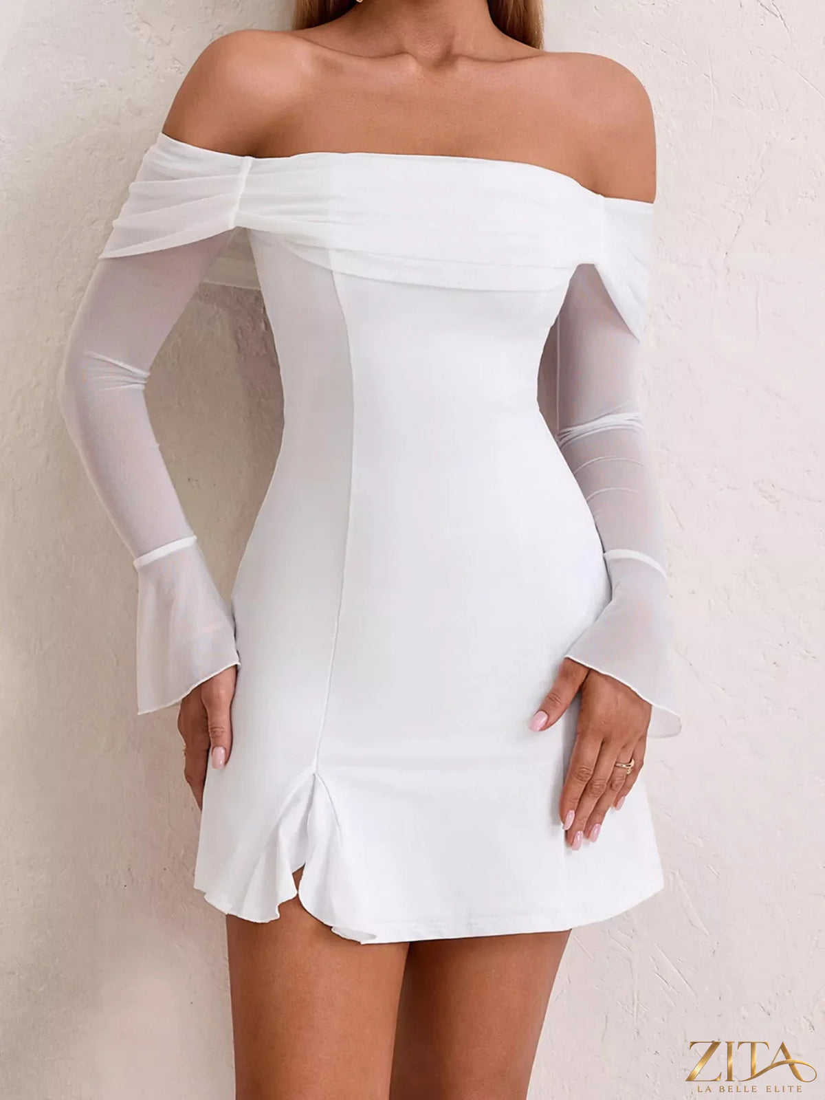 Off-shoulder long sleeve mini dress by Trendsi featuring a fitted silhouette and stylish design, shown in the product image.