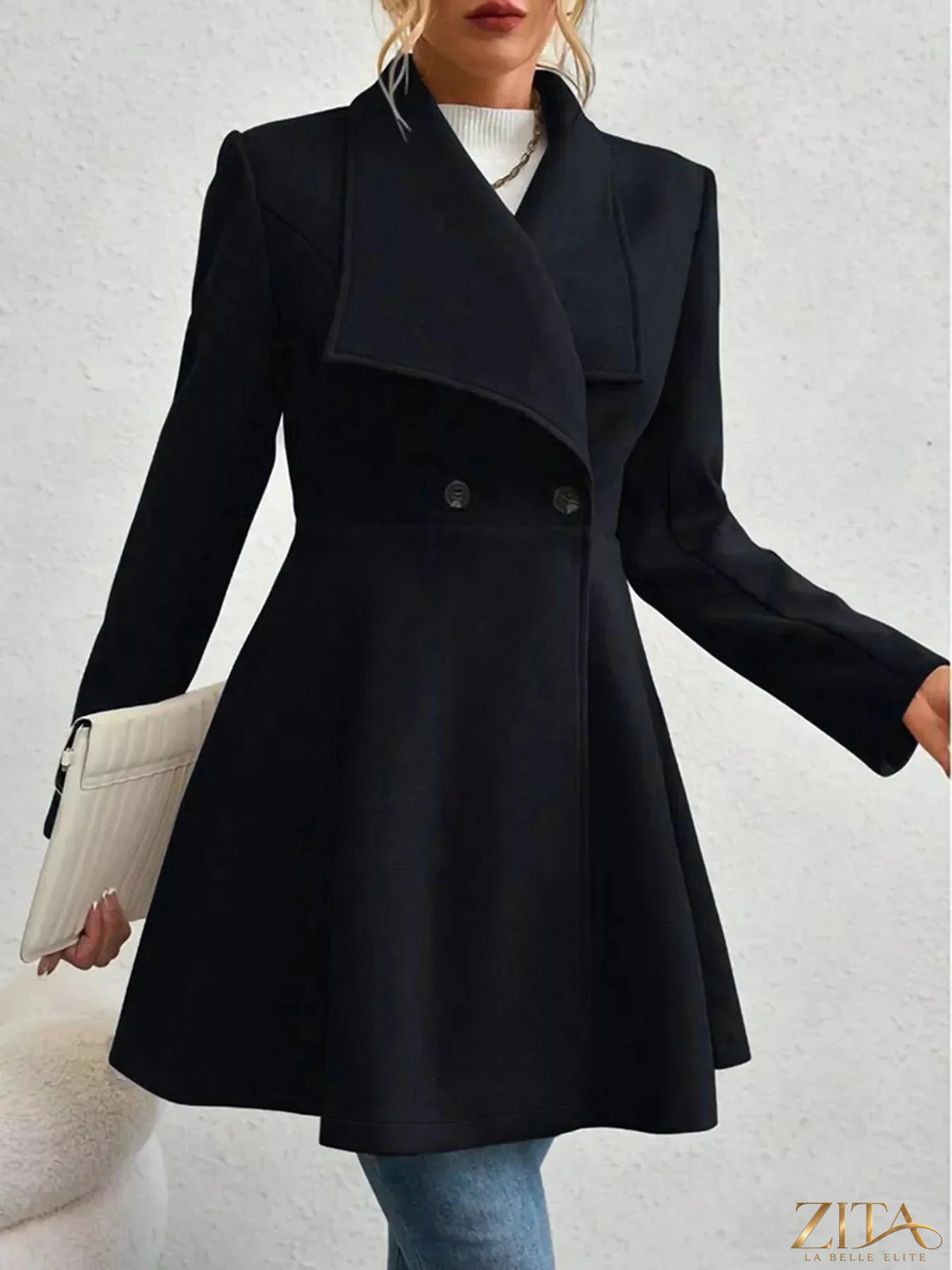 Zita La Belle Elite double-breasted wool blend coat with wide lapels and button details, displayed on a hanger.