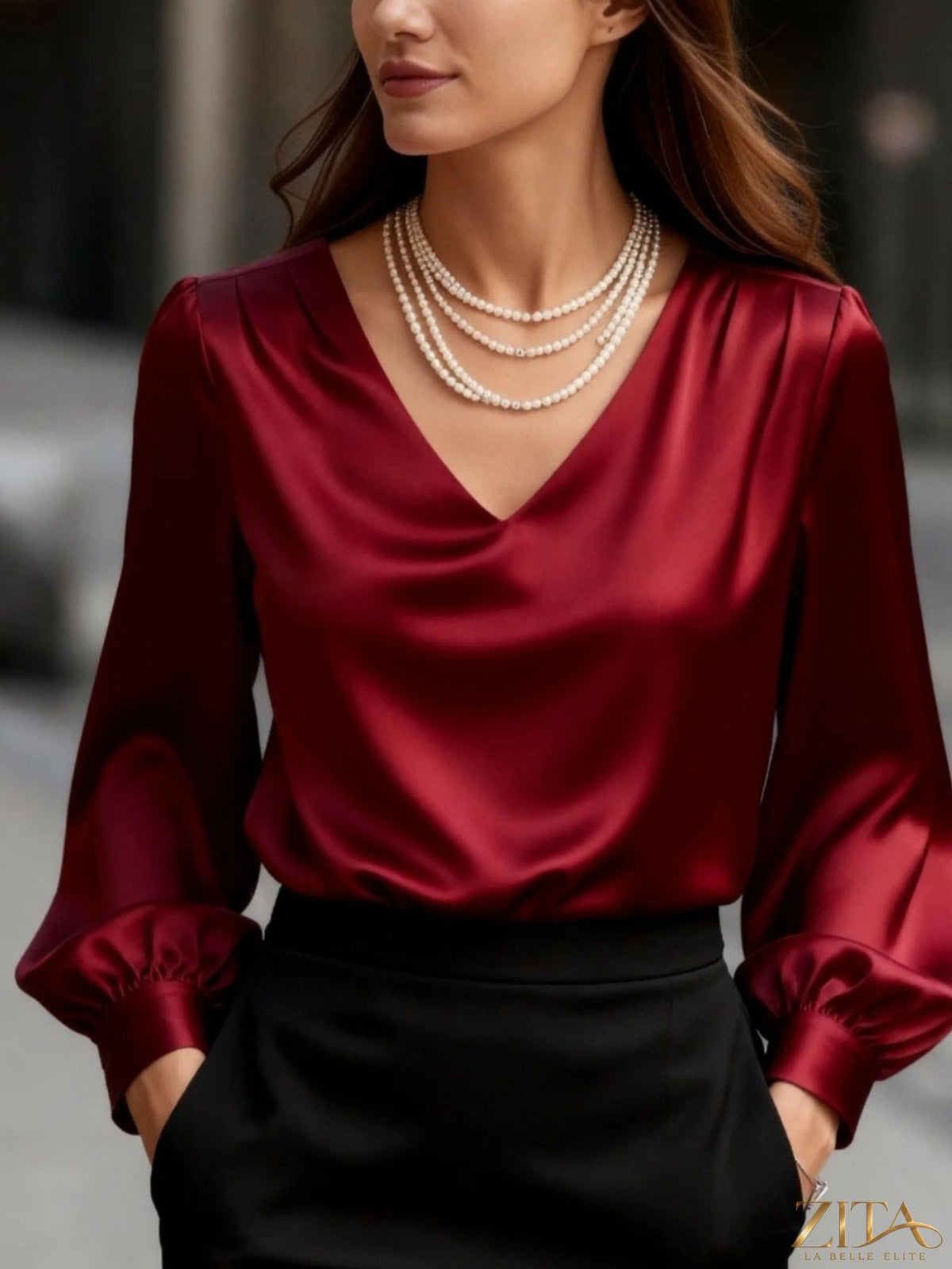 Zita La Belle Elite satin V-neck long sleeve blouse in elegant fabric, showcased on a model highlighting the stylish fit and silky texture.