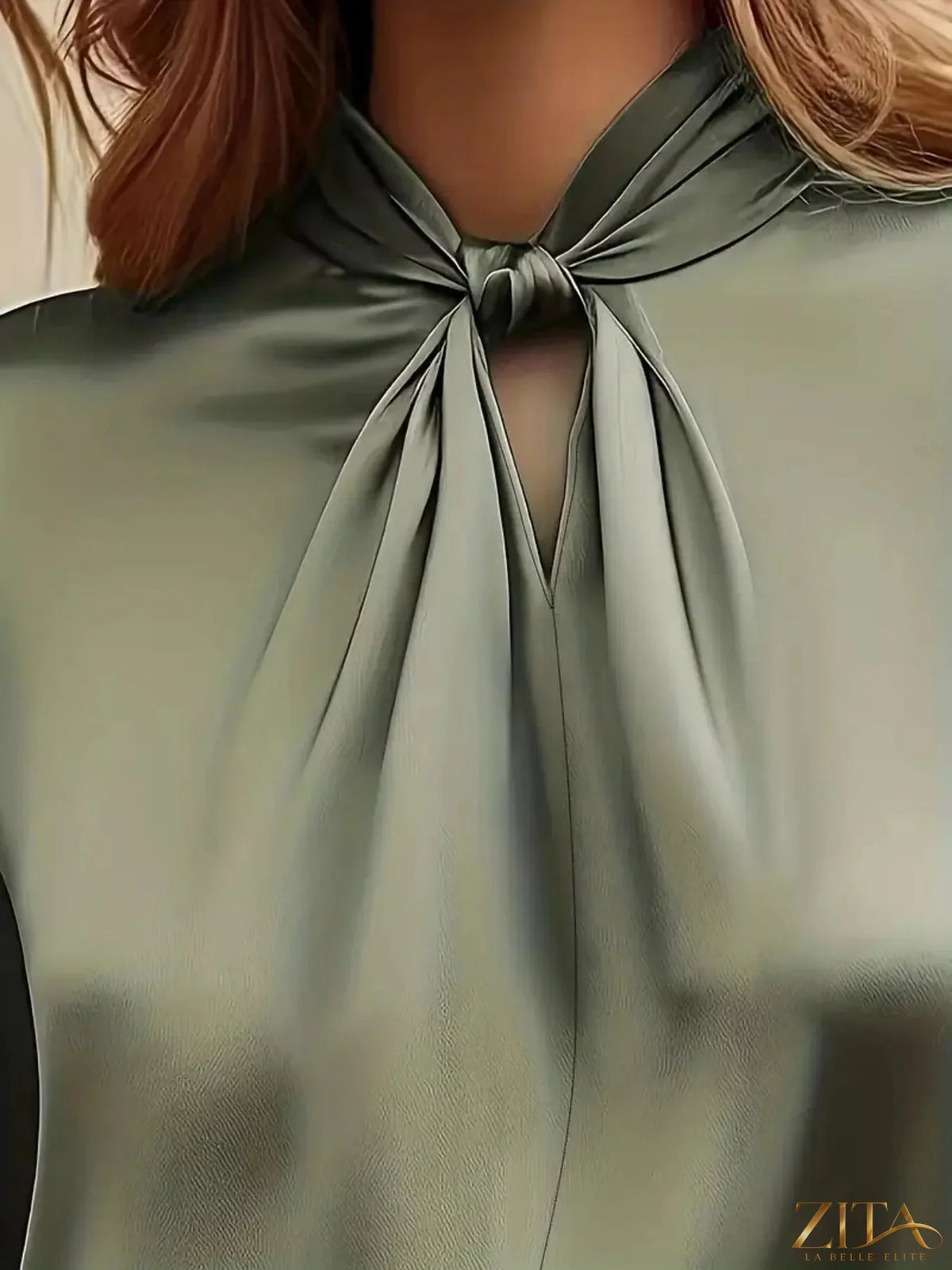Zita La Belle Elite satin cutout front blouse featuring a stylish design, smooth fabric, and elegant neckline detail.