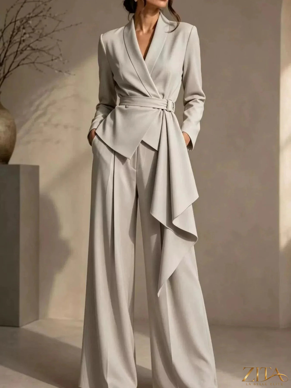 Plus size Zita La Belle Elite belted blazer and wide-leg pants set, shown on a model with the outfit styled for a fashionable look.