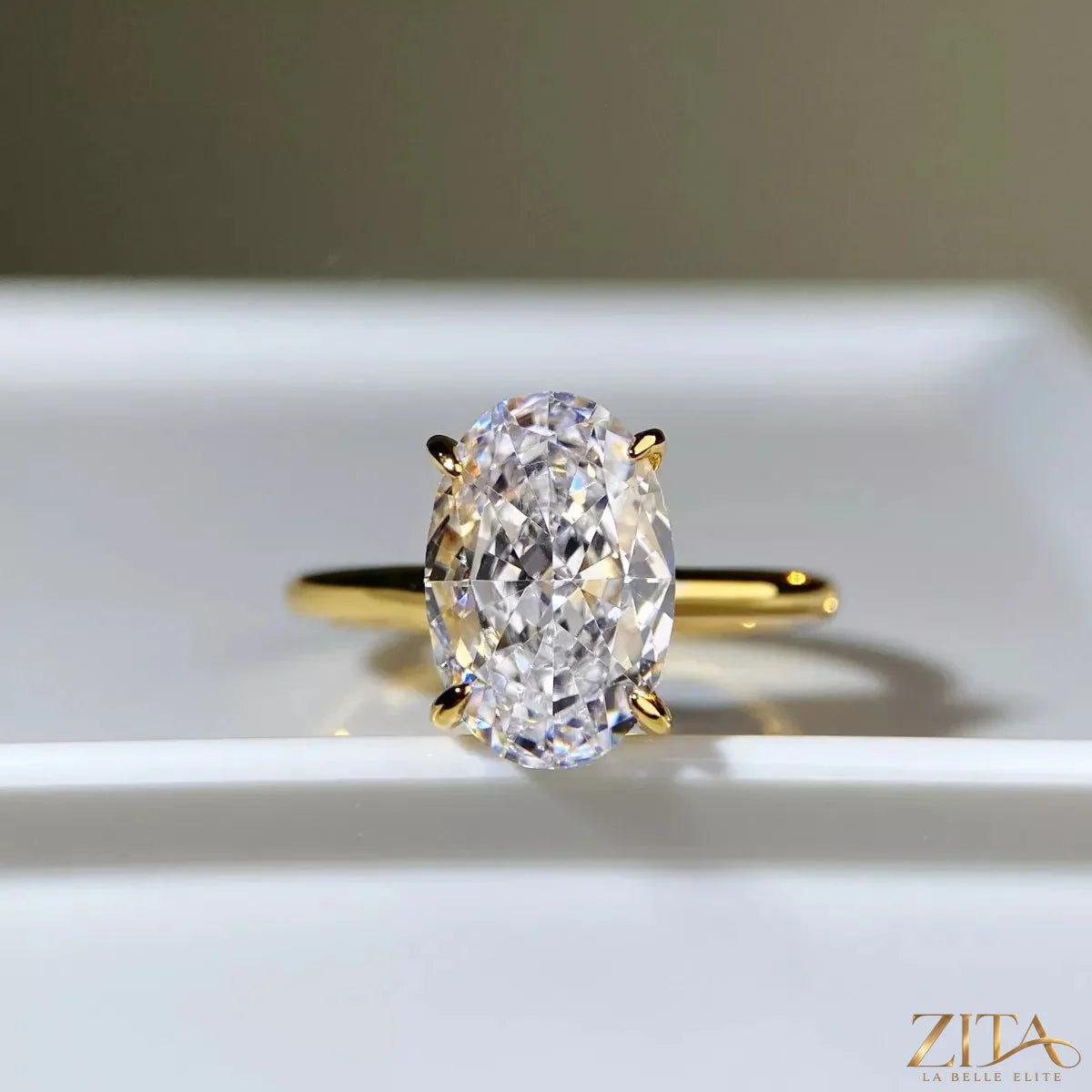 18K gold-plated zircon ring from Zita La Belle Elite featuring a sparkling gemstone and elegant design.