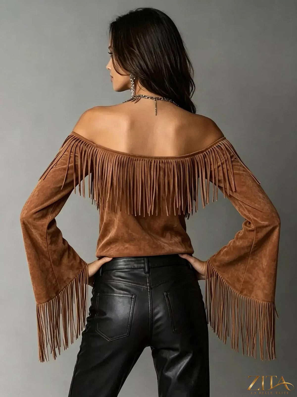 Plus size fringed off-shoulder T-shirt by Trendsi, featuring a full-size fit and stylish fringe detail on the shoulders.