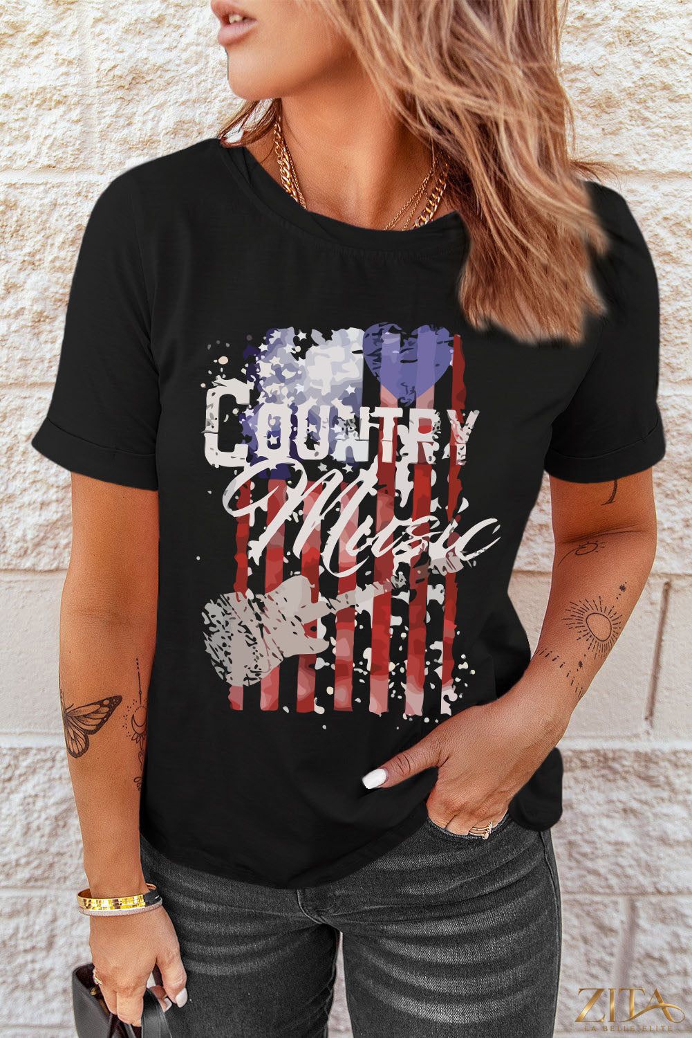 Country music graphic T-shirt by Trendsi featuring a bold country music design on a casual tee shirt.