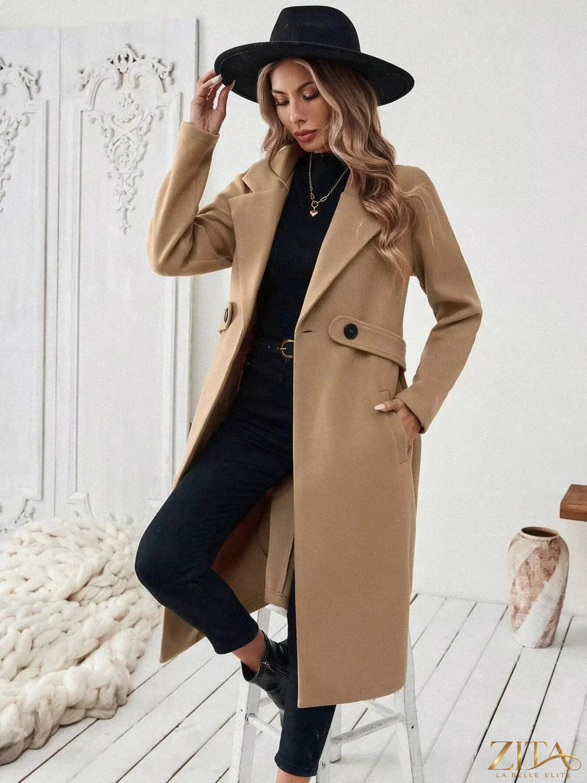Zita La Belle Elite one-button lapel collar overcoat shown on a model, featuring a sleek design and tailored fit.