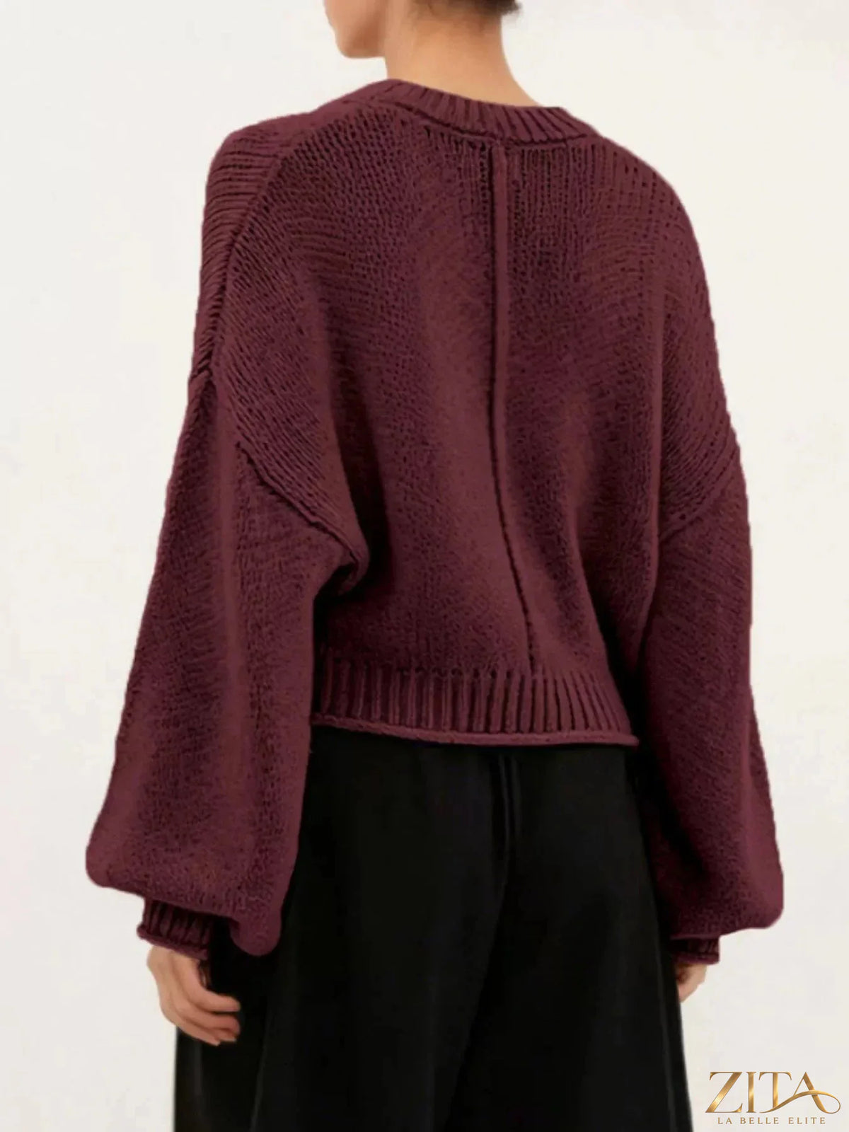 Oversized chunky knit sweater by Trendsi featuring thick woolen fabric, cozy fit, and a relaxed, stylish look.