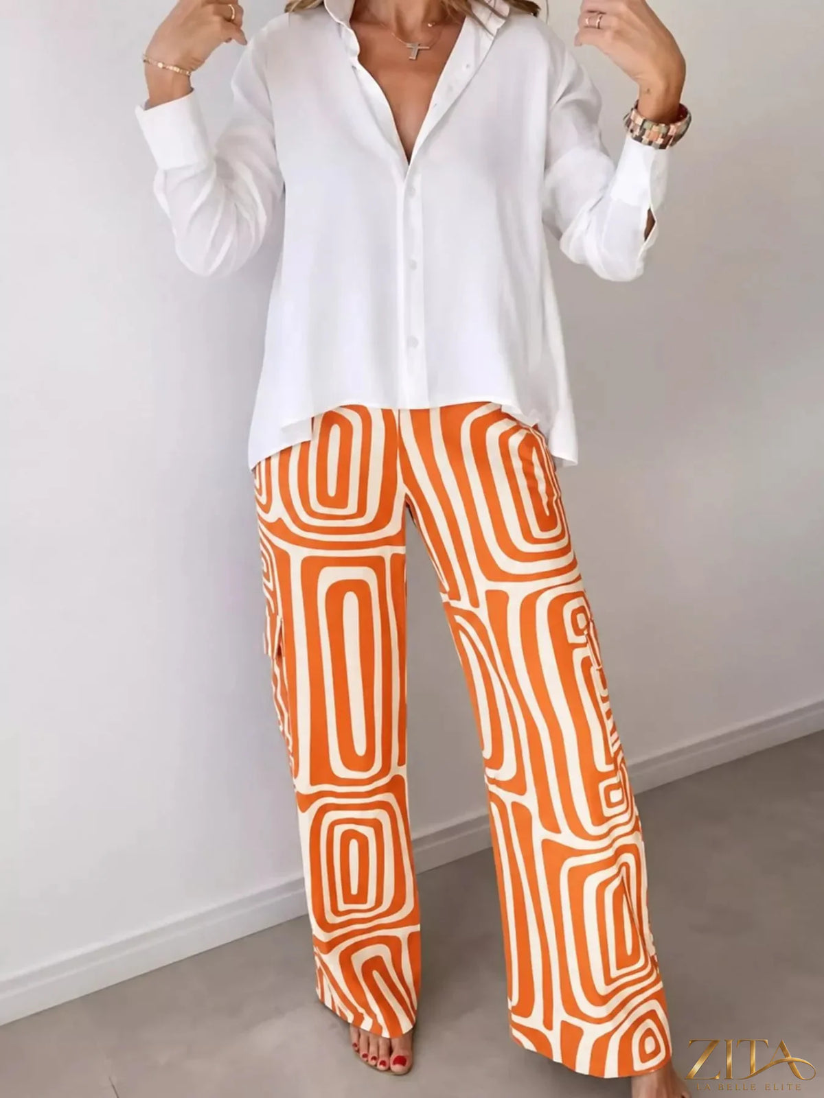 Plus size Zita La Belle Elite button-down shirt and geometric wide-leg pants set, featuring a stylish and comfortable matching outfit.