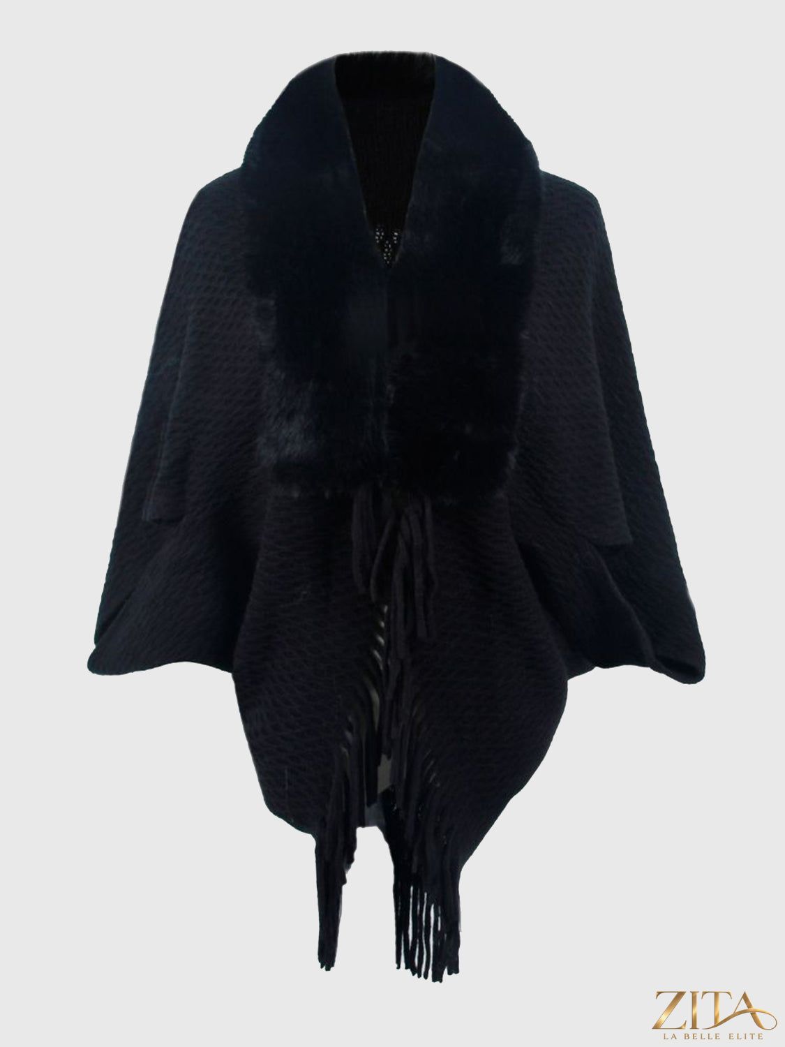 Open front fringe hem poncho by Trendsi featuring a stylish draped design and fringe details for a chic, bohemian look.