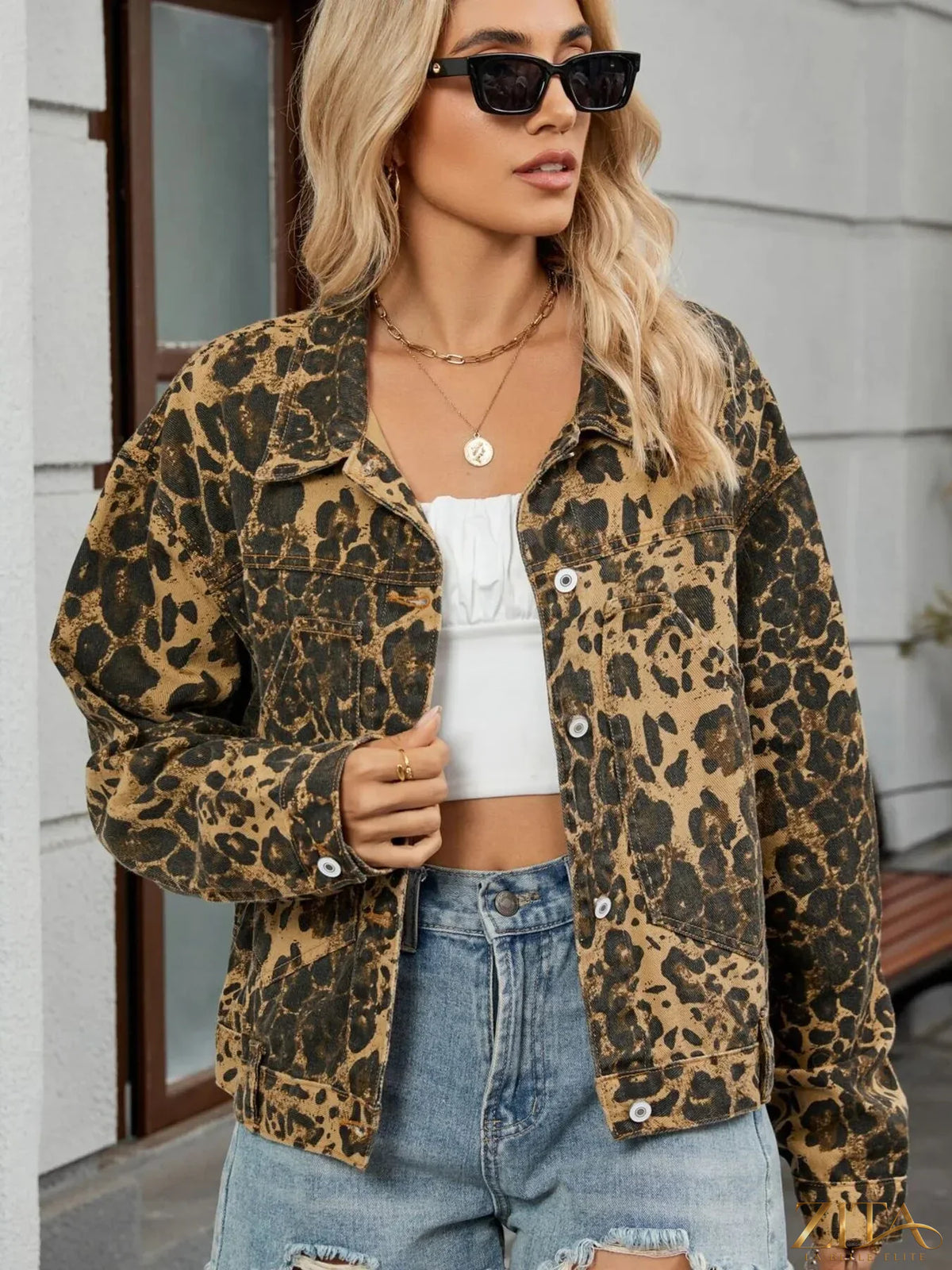 Leopard print button-up denim jacket from Trendsi featuring classic collar and long sleeves, stylish and casual for everyday wear.