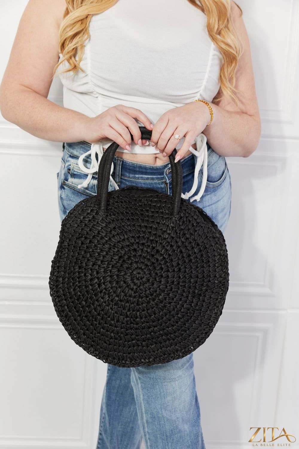 Justin Taylor Beach Date Straw Rattan Handbag in black with woven rattan design, stylish and lightweight for summer outings.