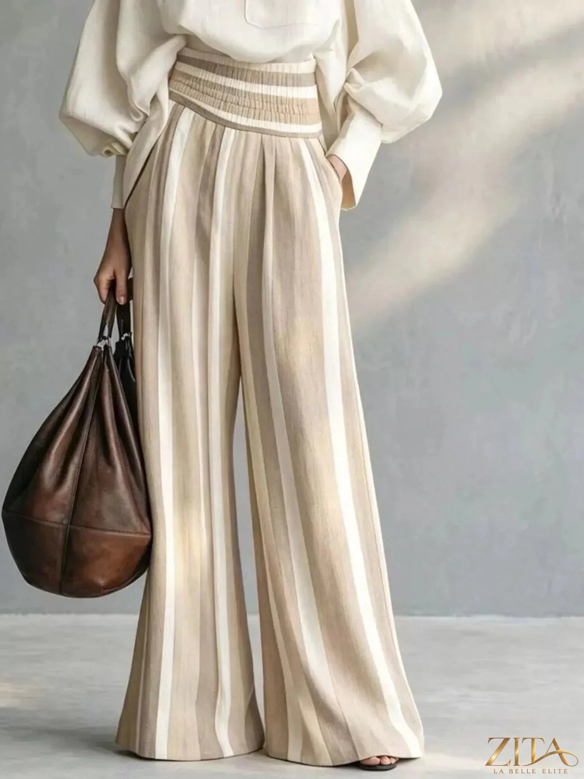 Plus size full size mock neck top with striped wide-leg pants set by Trendsi, featuring a stylish, comfortable matching outfit.