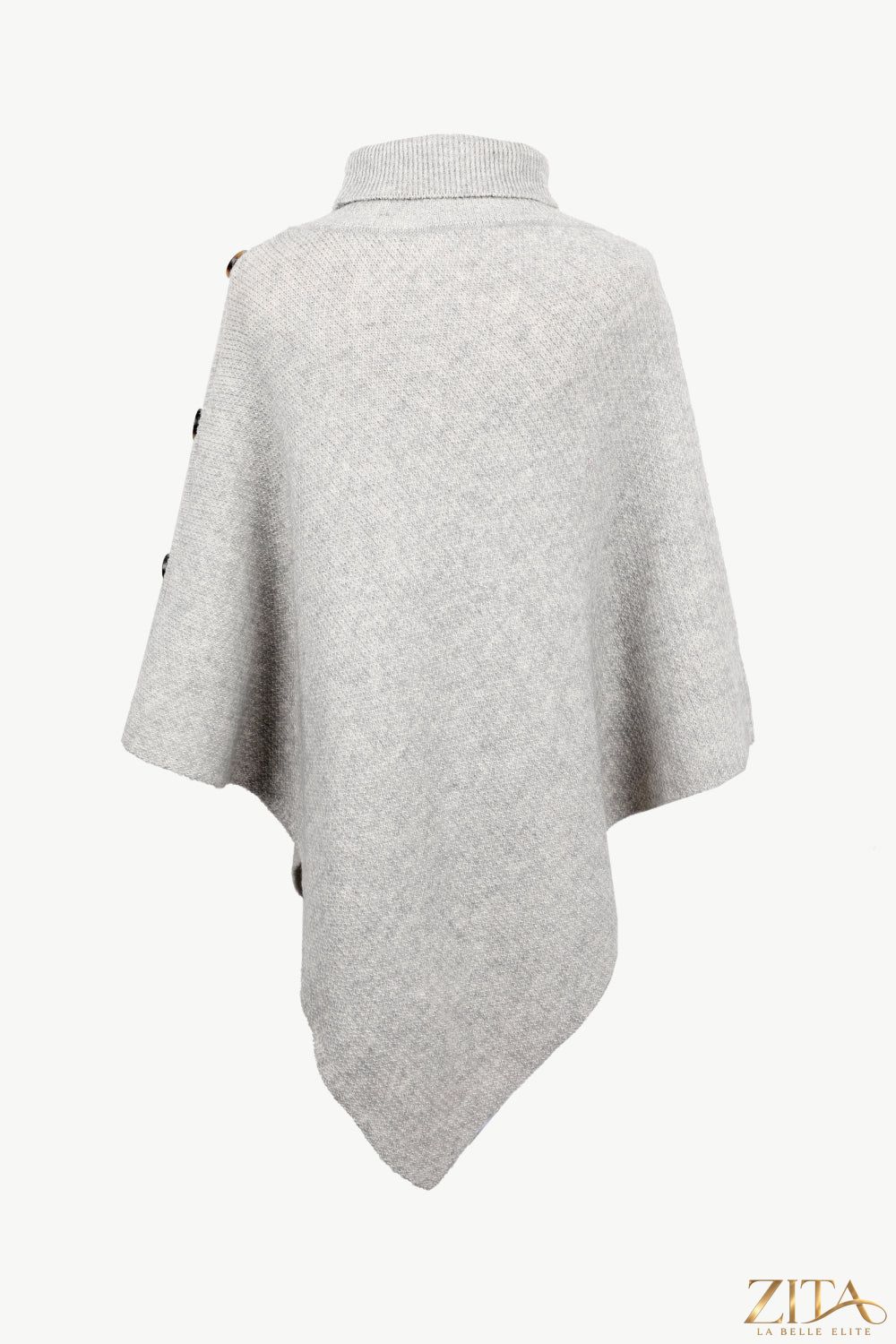 Zita La Belle Elite buttoned turtleneck poncho displayed on a mannequin, featuring a cozy knit fabric and classic design.