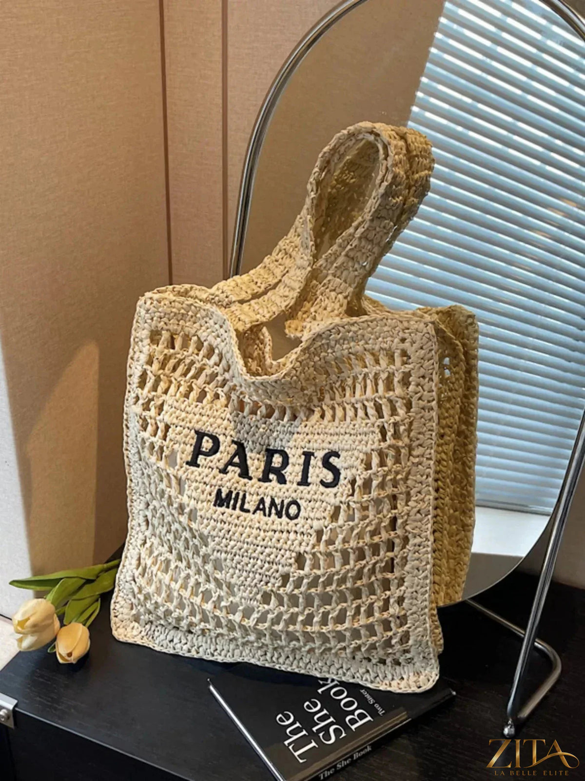 Crochet knit shoulder bag by Zita La Belle Elite featuring a textured, stylish design with a shoulder strap and handcrafted details.