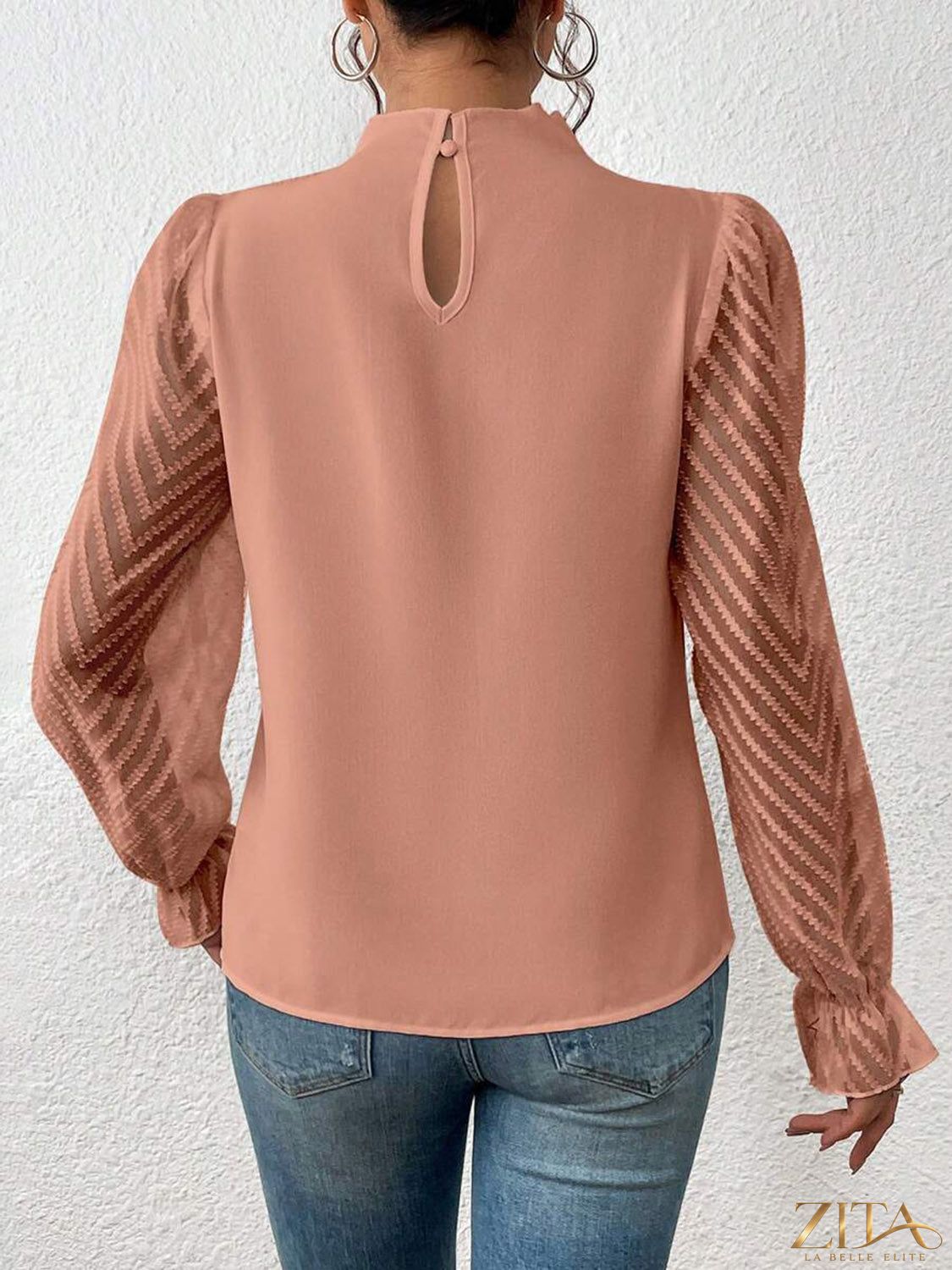Zita La Belle Elite mock neck blouse with flounce sleeve design, featuring elegant ruffle details and a fitted silhouette.