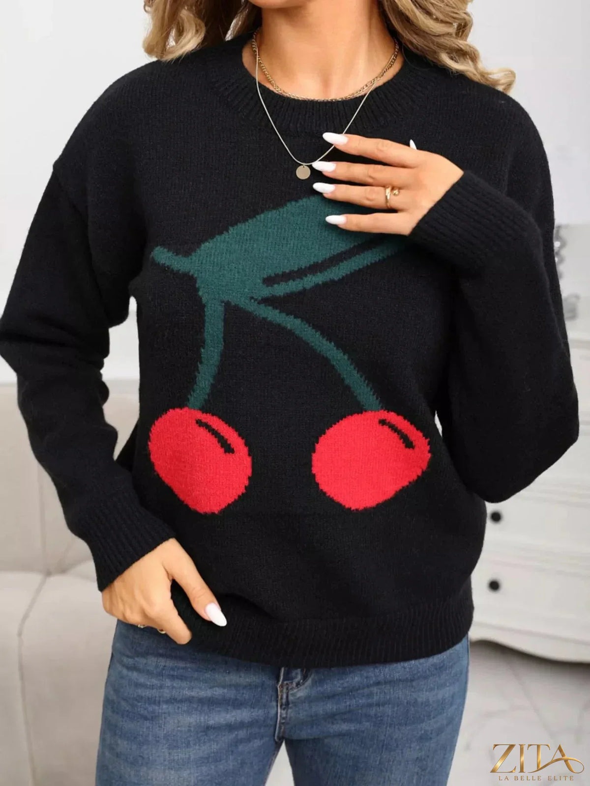 Cherry-colored round neck sweater from Trendsi, featuring a cozy knit design and classic fit, displayed on a mannequin.