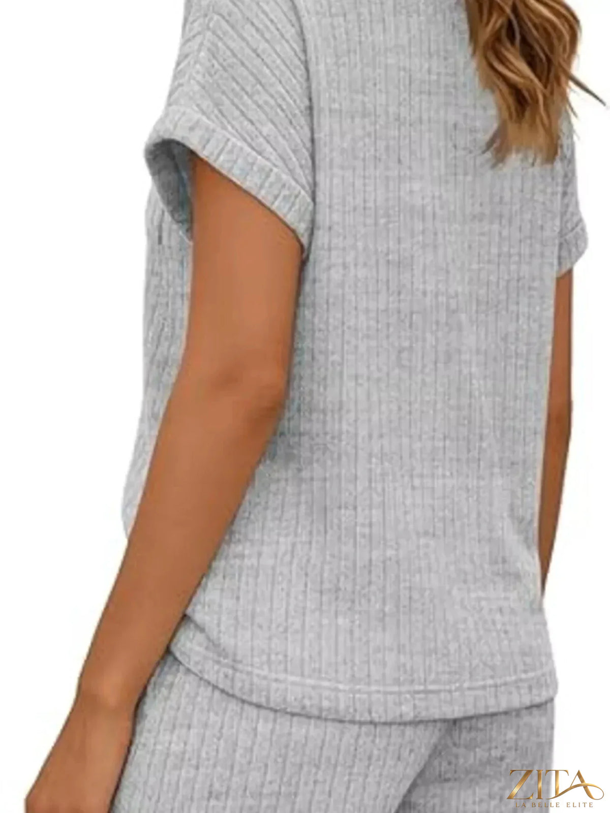 Casual ribbed knit tee and shorts set from Trendsi, featuring a comfortable, relaxed fit in neutral tones.