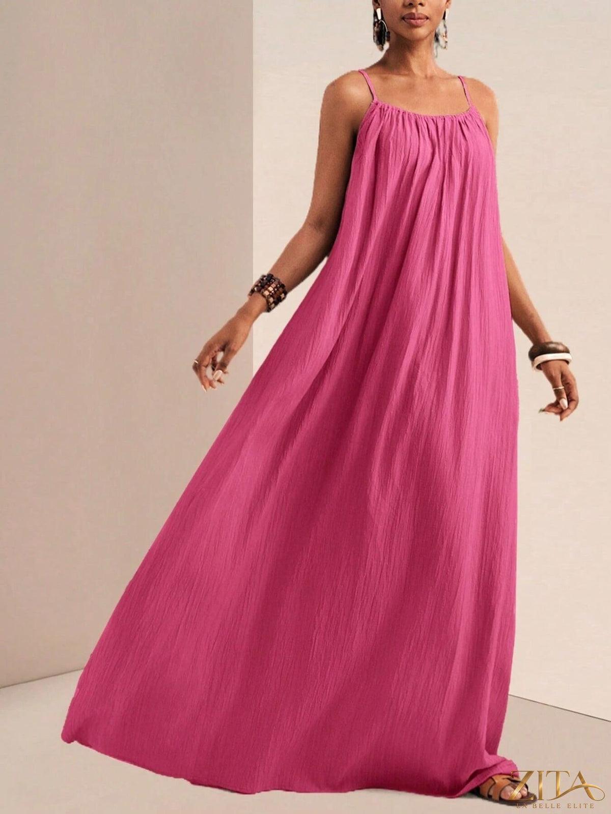 Flowy maxi dress with spaghetti straps from Zita La Belle Elite, featuring a lightweight fabric and elegant design.