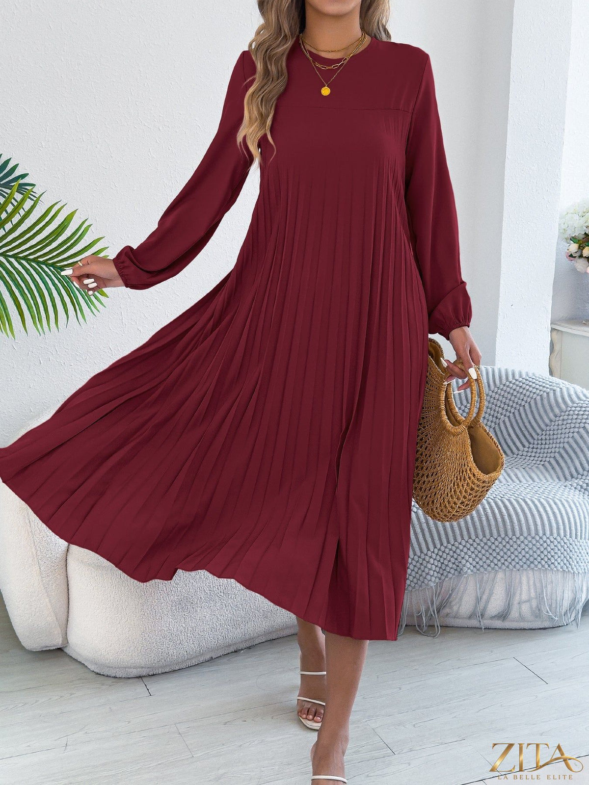 Zita La Belle Elite pleated A-line midi dress in soft fabric, showcasing a flattering silhouette and elegant design.