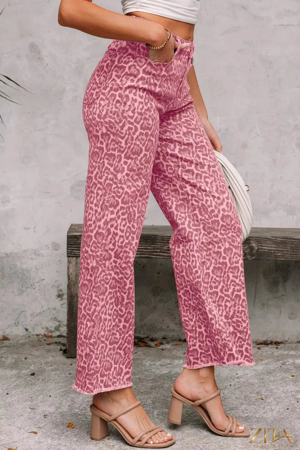 Leopard print frayed edge wide-leg high waist jeans by Zita La Belle Elite displayed on a model.