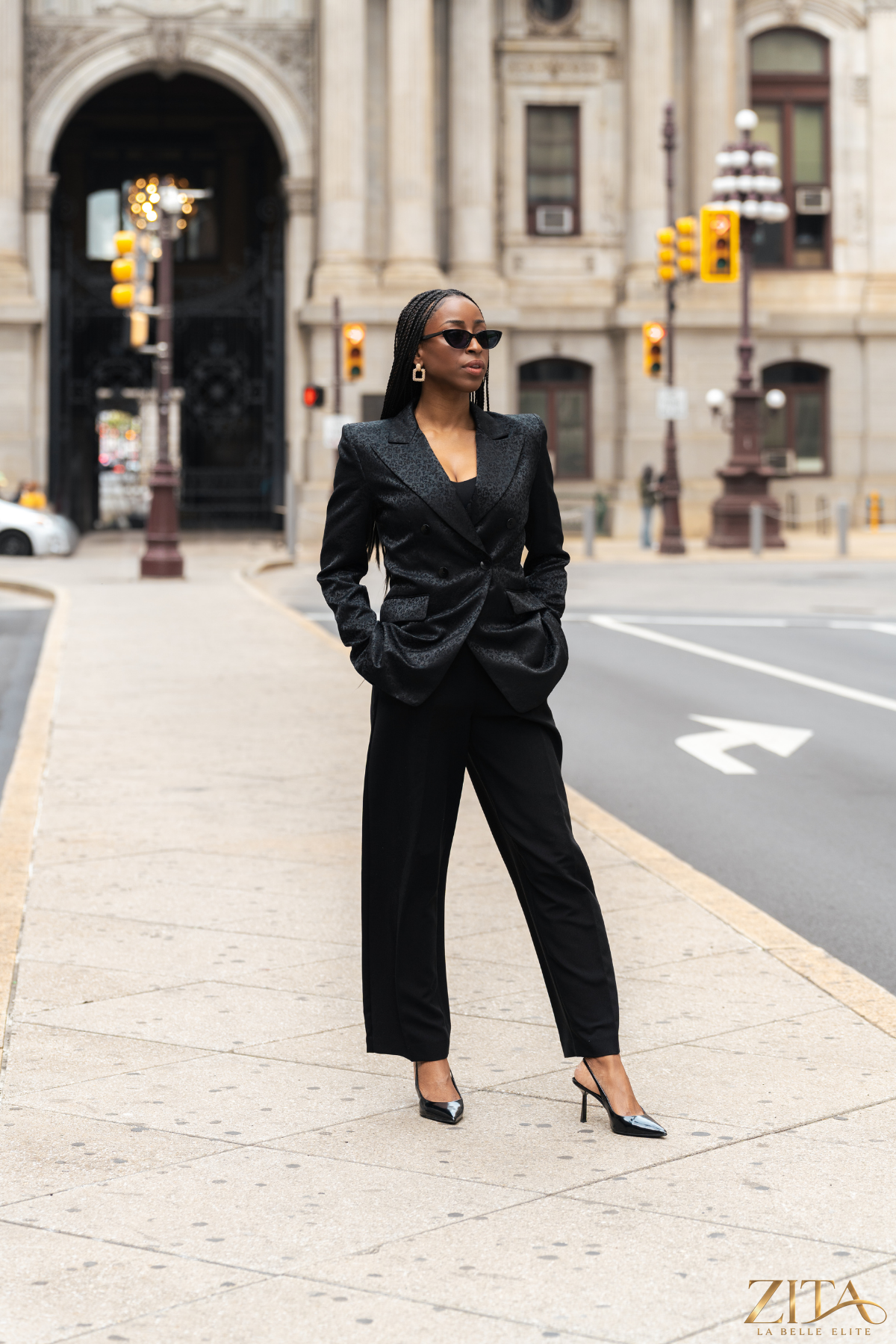 Black blazer by Zita La Belle Elite featuring a tailored fit and classic lapel, shown on a model.