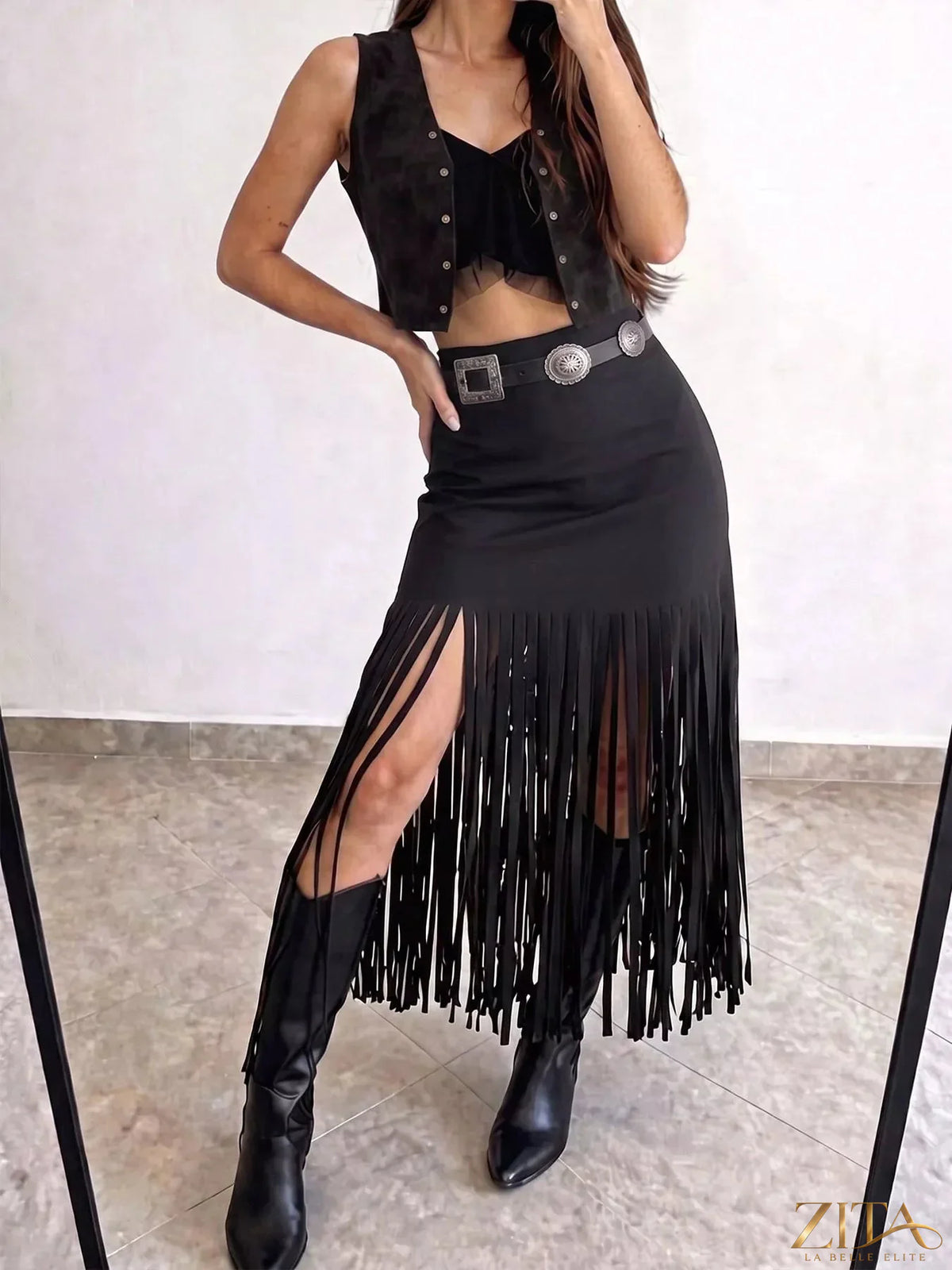 Zita La Belle Elite high-waisted fringe midi skirt in flowing fabric with layered fringe detail and a fitted waistband.