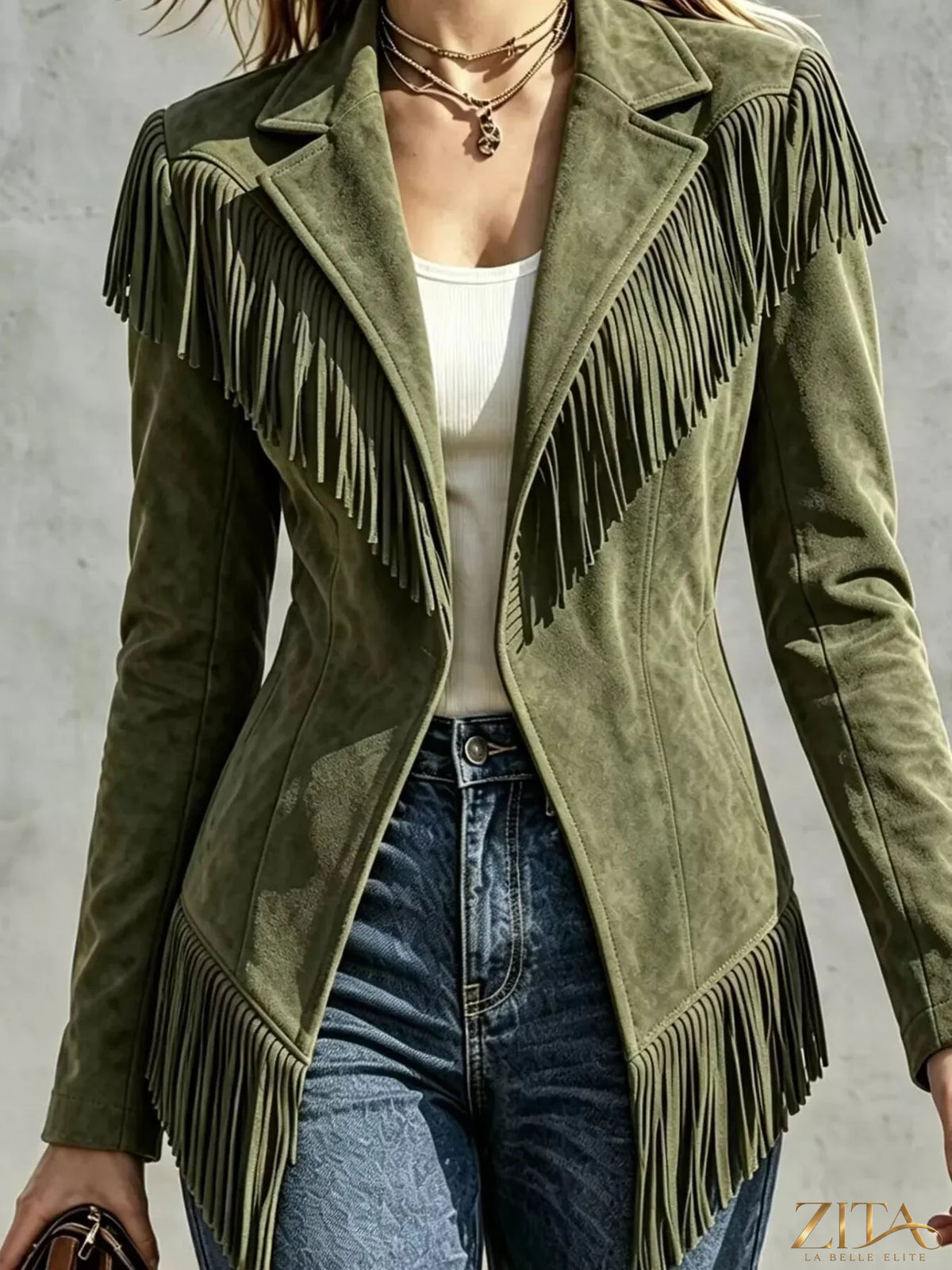 Western-inspired fringed open front jacket from Trendsi, featuring a stylish design with fringe details and a relaxed fit.