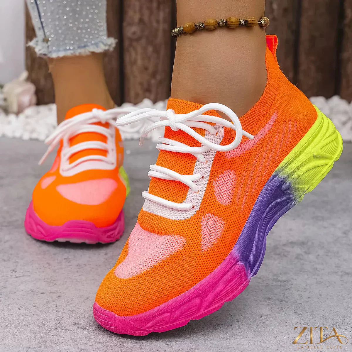 Zita La Belle Elite lace-up round toe sneakers with white soles and stylish design on a clean background.