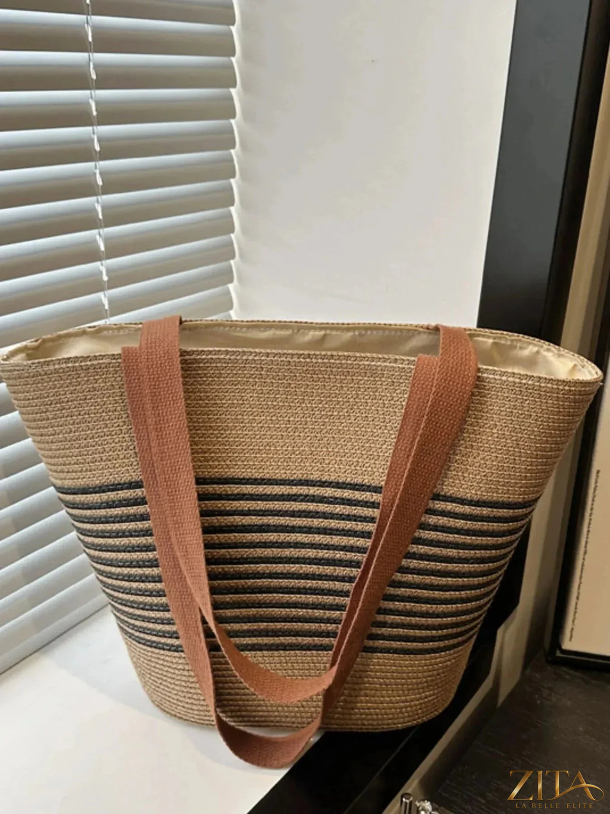 Striped woven tote bag by Zita La Belle Elite with sturdy handles and spacious interior, perfect for everyday carrying.