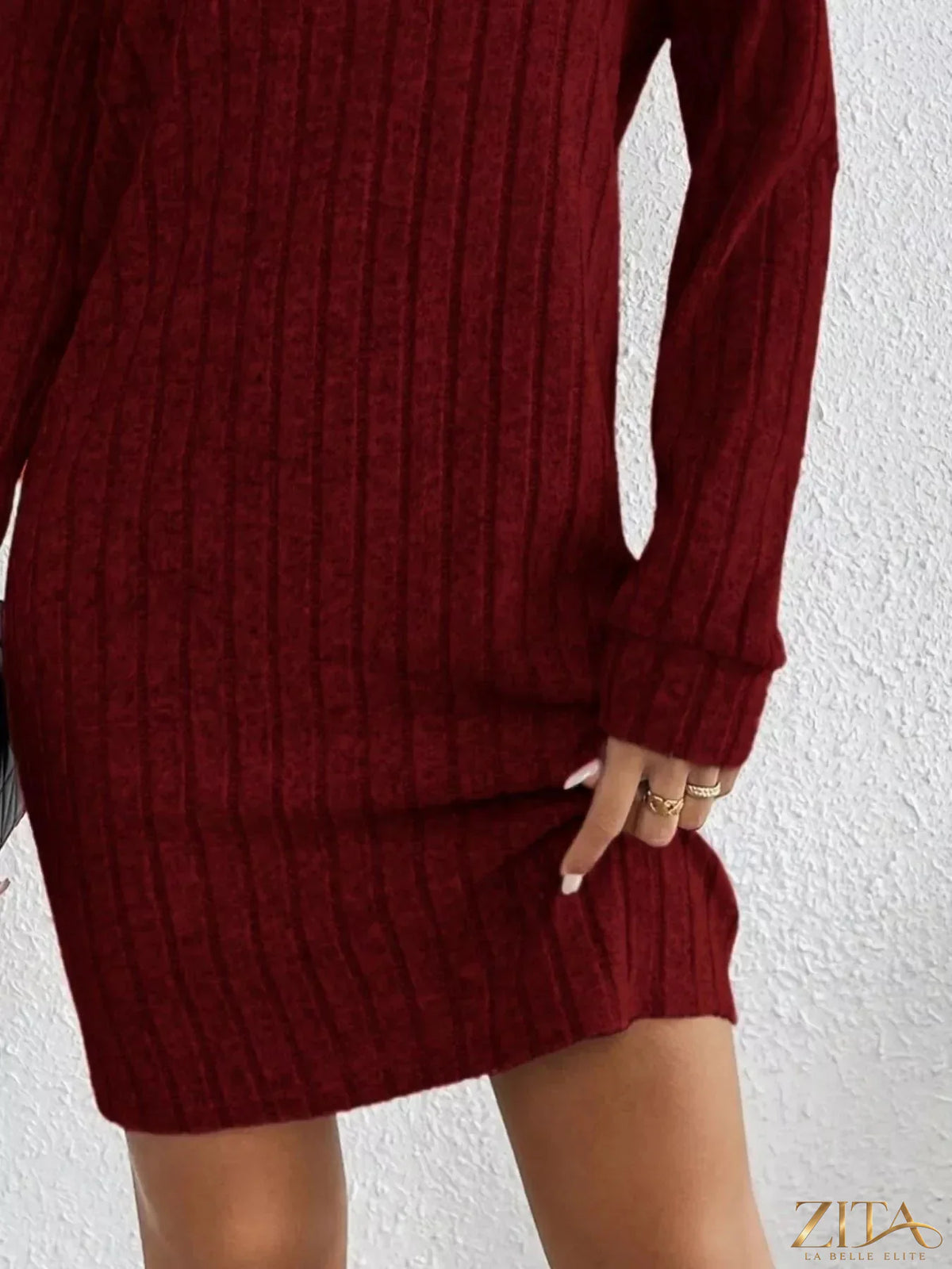 Casual ribbed turtleneck long sleeve mini dress from Trendsi, featuring a fitted silhouette and soft knit fabric.