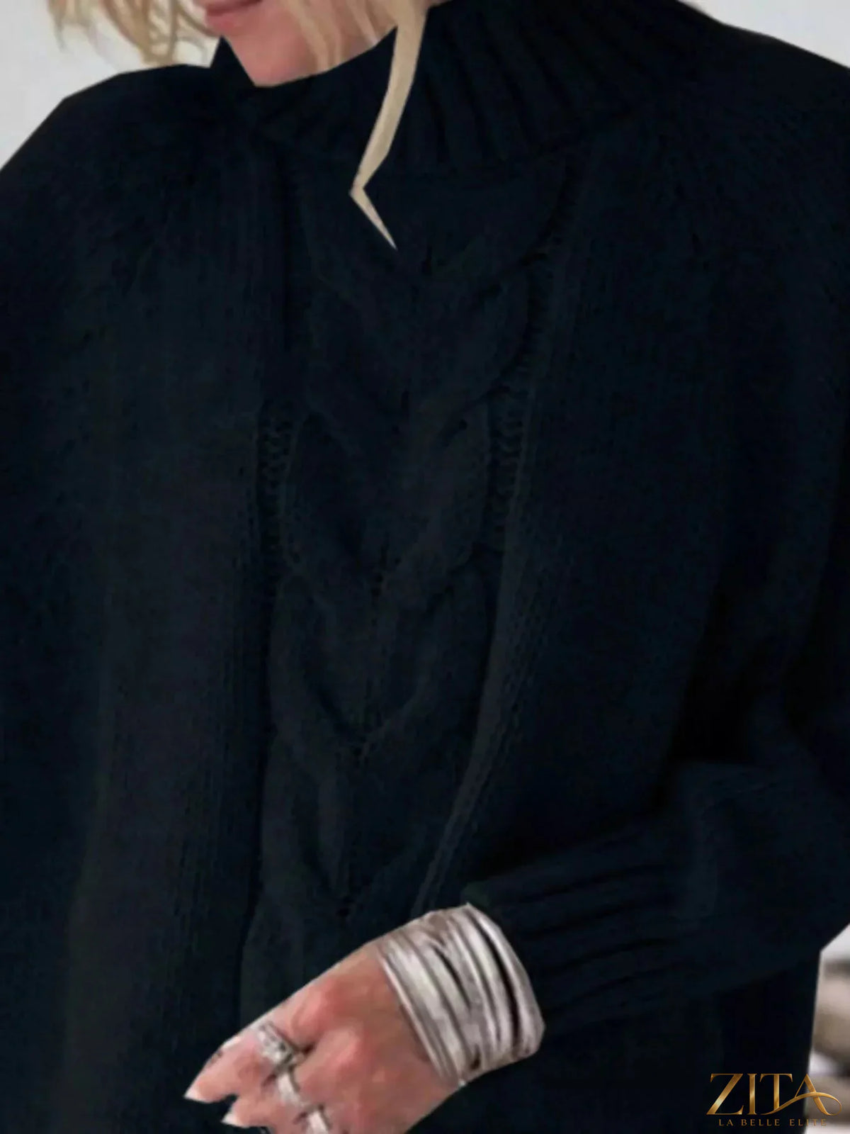 Cable-knit long sleeve sweater by Zita La Belle Elite, featuring a cozy, textured knit pattern and classic fit.