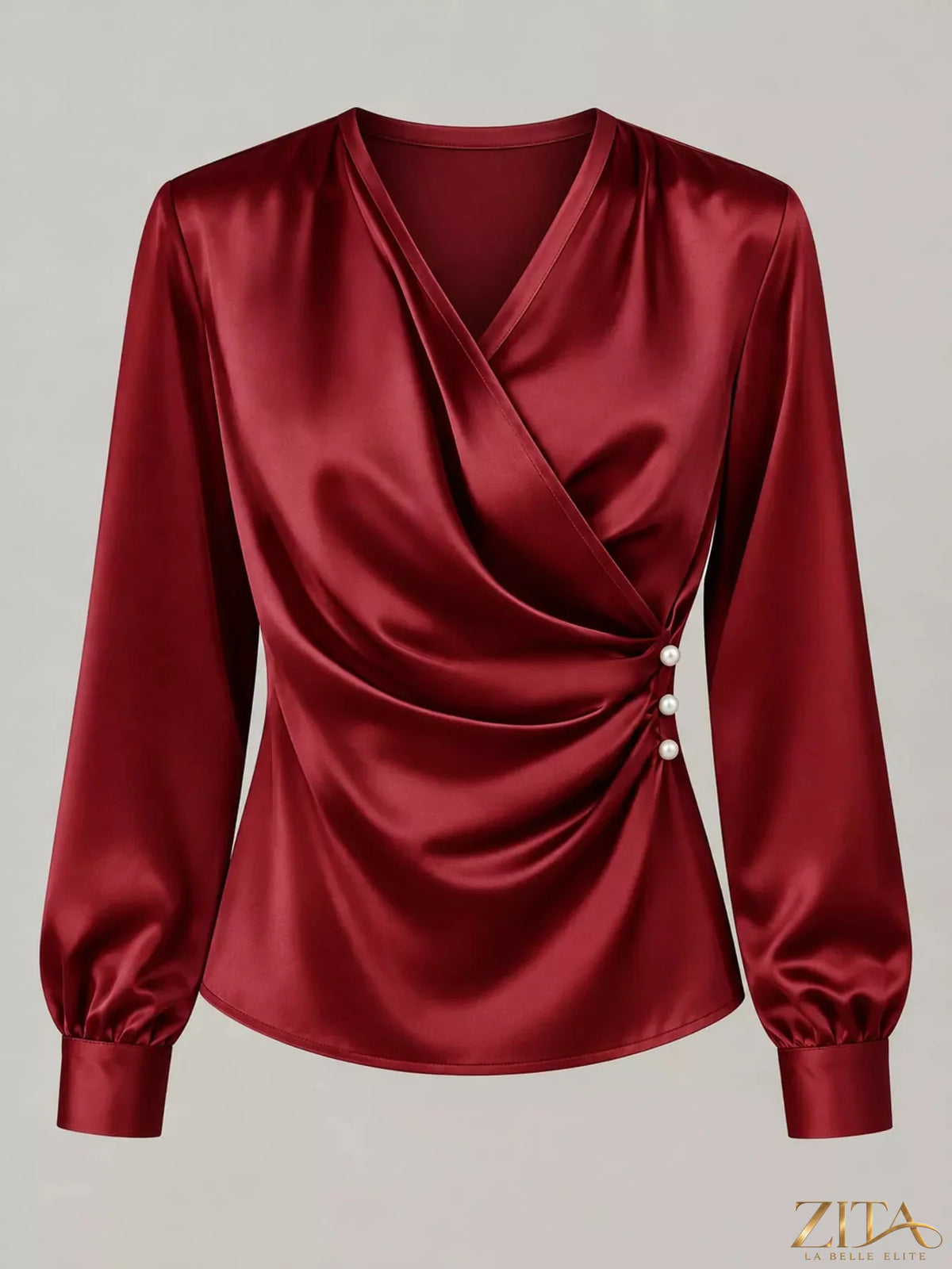 Zita La Belle Elite satin surplice long sleeve blouse with V-neck, draped fabric, and elegant fit, shown in a stylish fashion image.