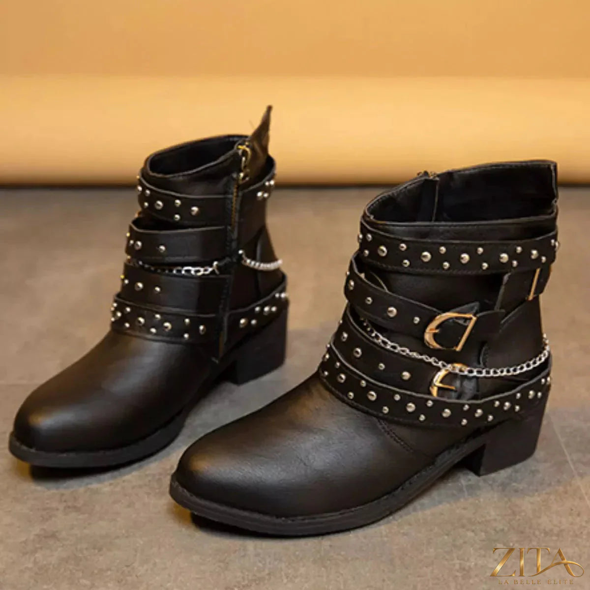 Zita La Belle Elite studded buckle ankle boots with pointed toes and strap accents, stylish footwear for casual or dressy wear.
