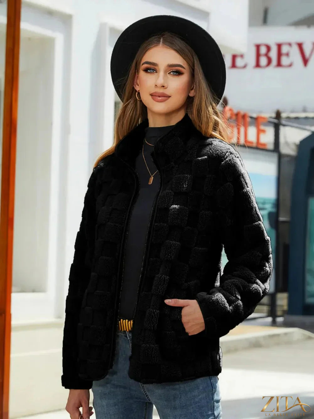 Zita La Belle Elite fuzzy checkered zip-up jacket with a cozy, stylish design and front zipper, perfect for casual wear.