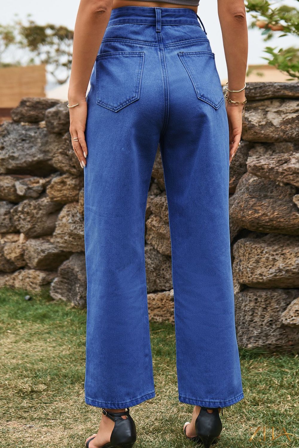 Zita La Belle Elite high waist loose fit ankle slit jeans displayed on a model, showcasing relaxed fit and stylish slit detail at the ankle.