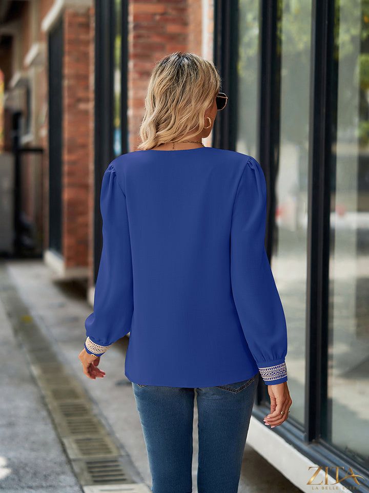 Zita La Belle Elite V-neck long sleeve blouse in soft fabric, featuring a stylish fit and elegant design on a neutral background.