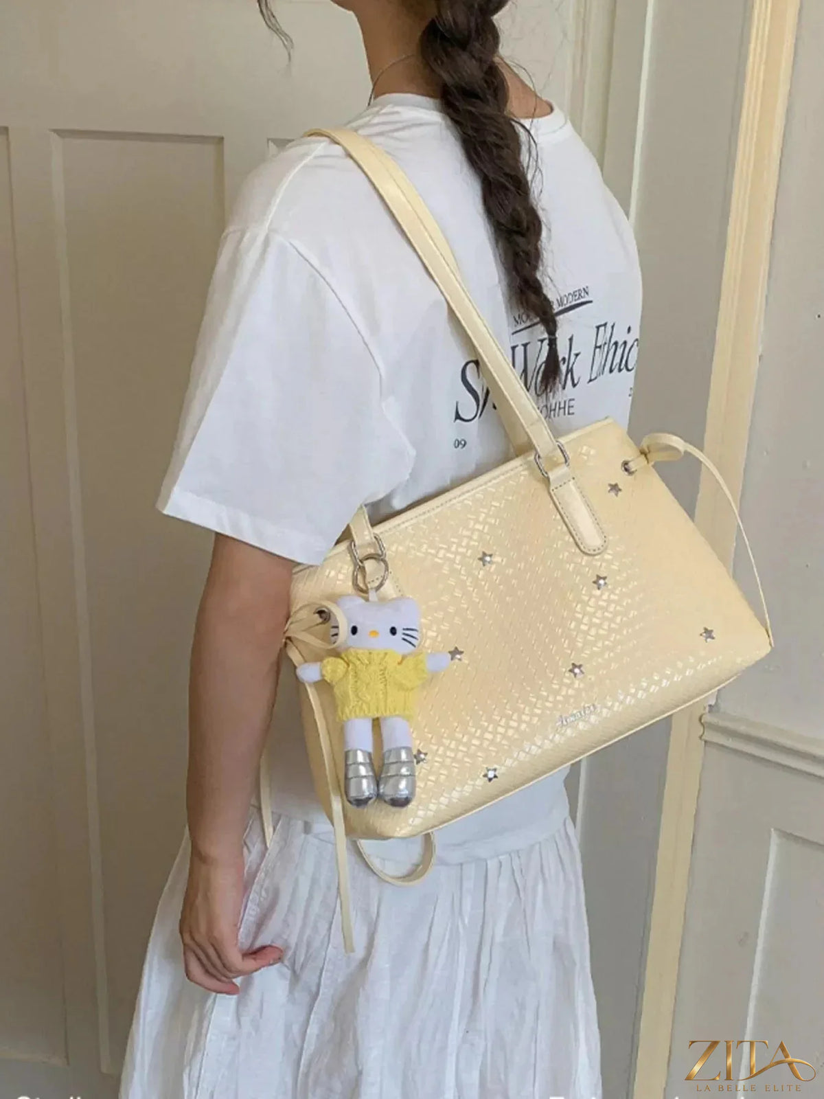 Zita La Belle Elite PU leather convertible tote bag with structured design and dual top handles, showcasing its versatile style.