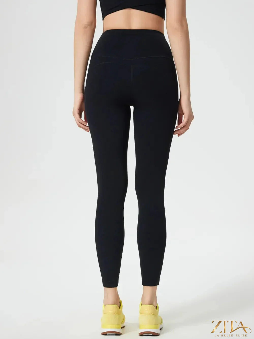 Trendsi Millennia wide waistband active leggings in black, showing the high-rise fit and stretchy fabric for workout or casual wear