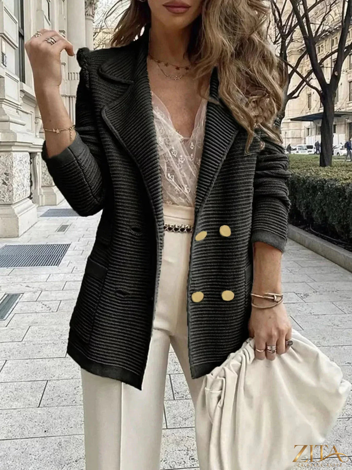 Zita La Belle Elite texture knit double-breasted blazer with notch lapels and tailored fit, displayed on a hanger.