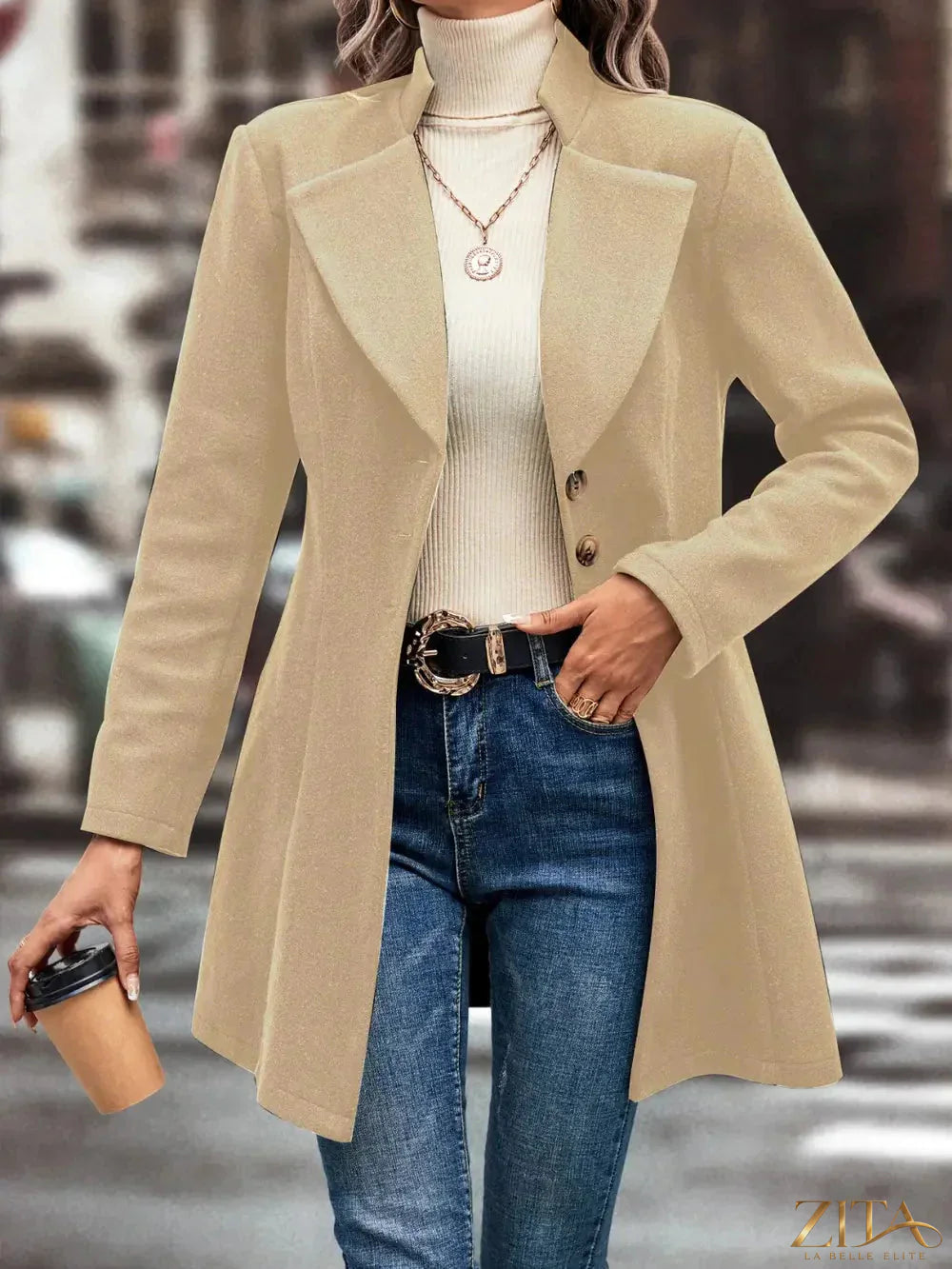Zita La Belle Elite button-up longline coat in neutral fabric, featuring a tailored collar and long sleeves, stylish and warm outerwear.