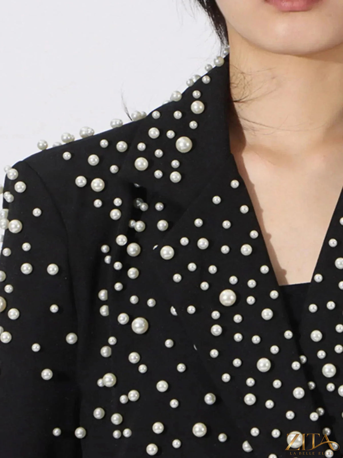 Pearl-embellished double-breasted blazer in navy from Trendsi, featuring elegant pearl accents and tailored fit.