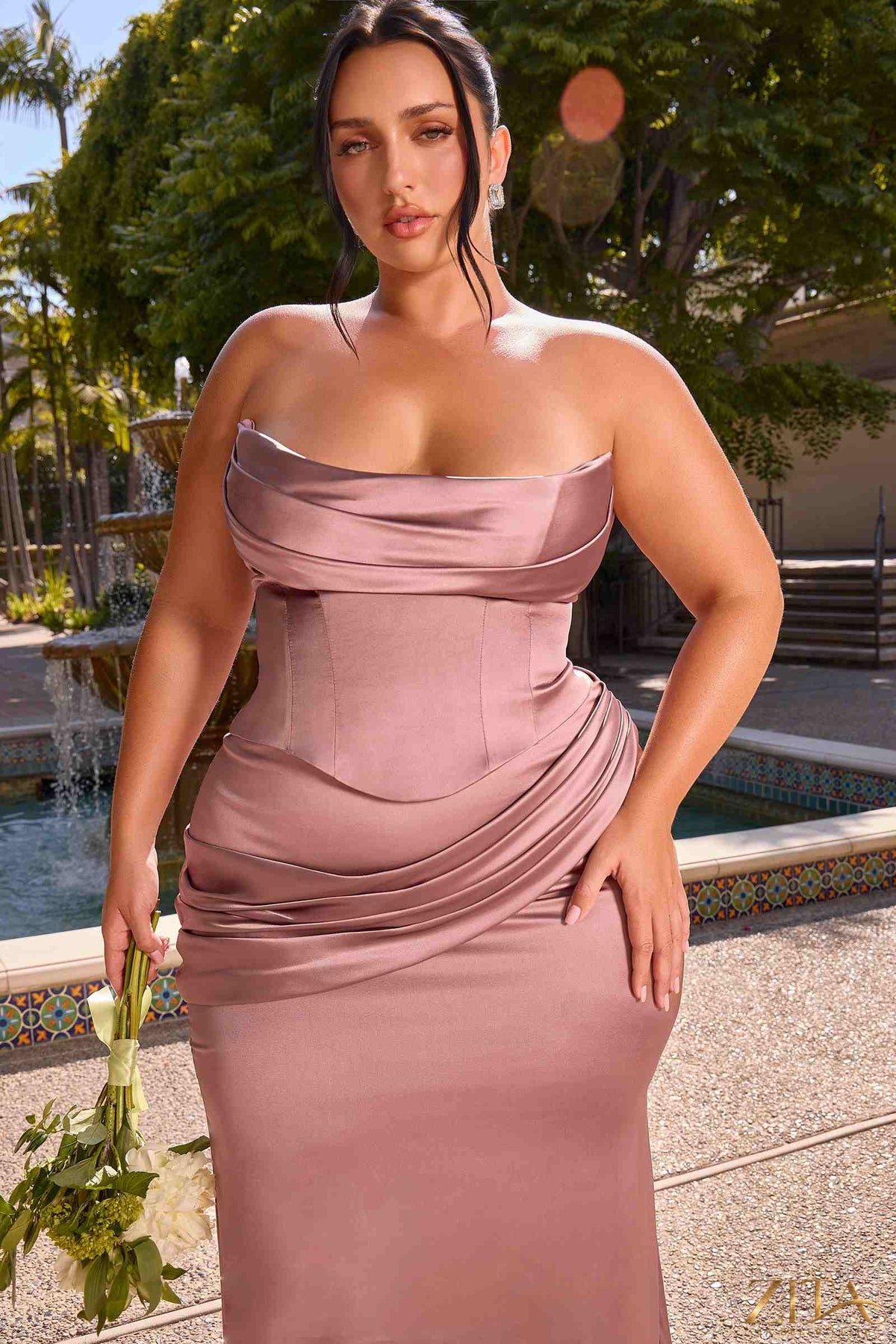 Elegant rosewood satin strapless two-piece fitted gown by Zita La Belle Elite, showcasing a sleek, form-fitting dress with a smooth satin finish.