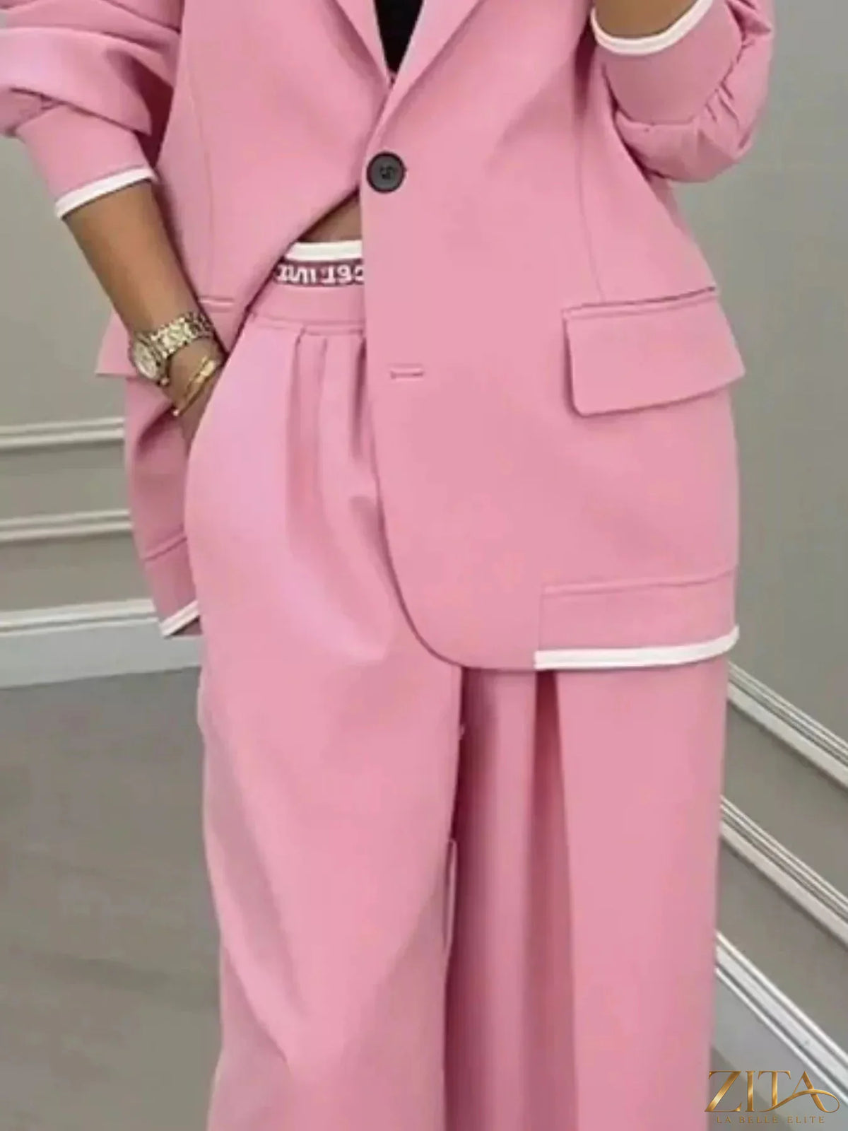 Plus size Zita La Belle Elite blazer and wide-leg pants set featuring a single-button blazer and matching trousers.