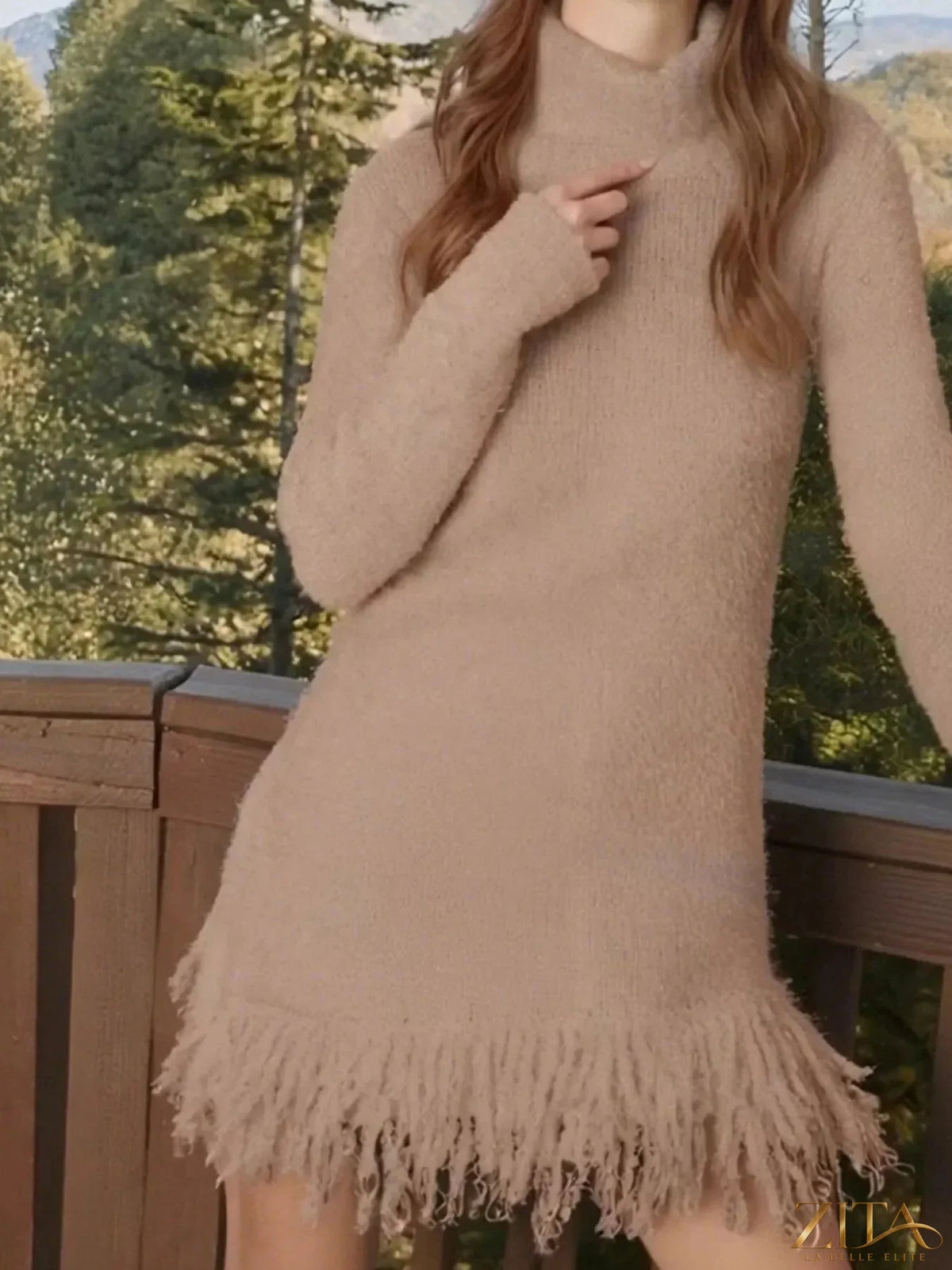 Black fringe turtleneck long sleeve sweater dress by Trendsi, featuring a cozy knit fabric and stylish fringe detail.