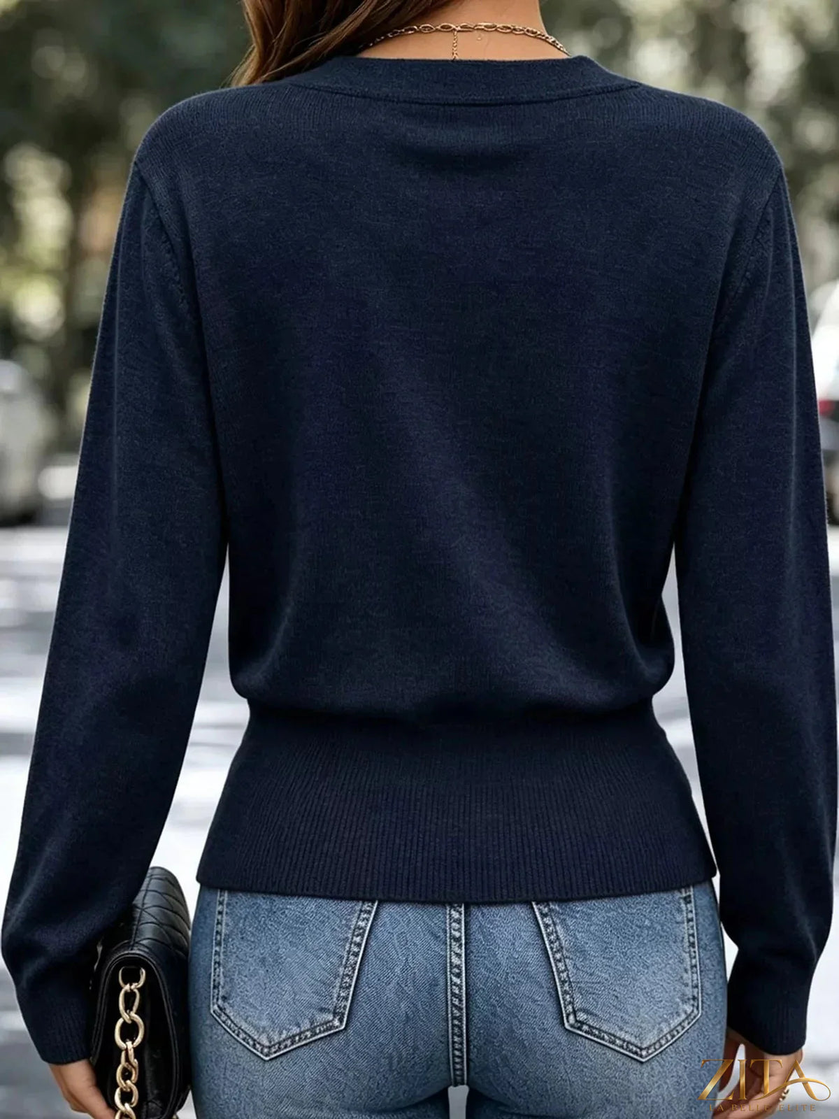 Zita La Belle Elite surplice long sleeve knit top with elastic waist, featuring a stylish and comfortable design.